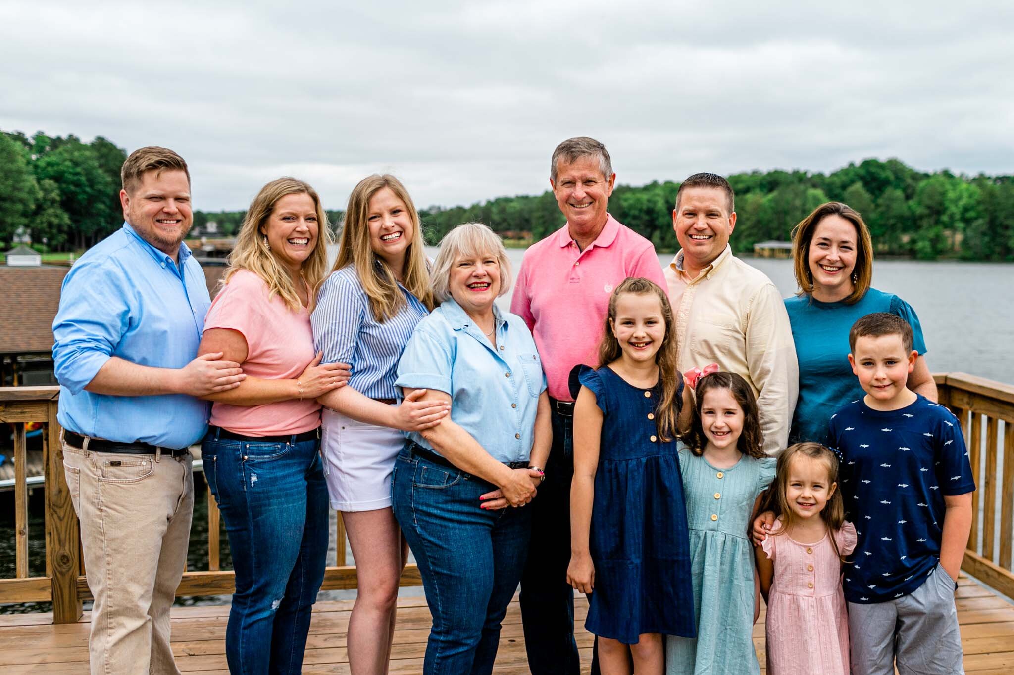 Lake Gaston Family Photographer | By G. Lin Photography | Beautiful candid family photo outside by the lake