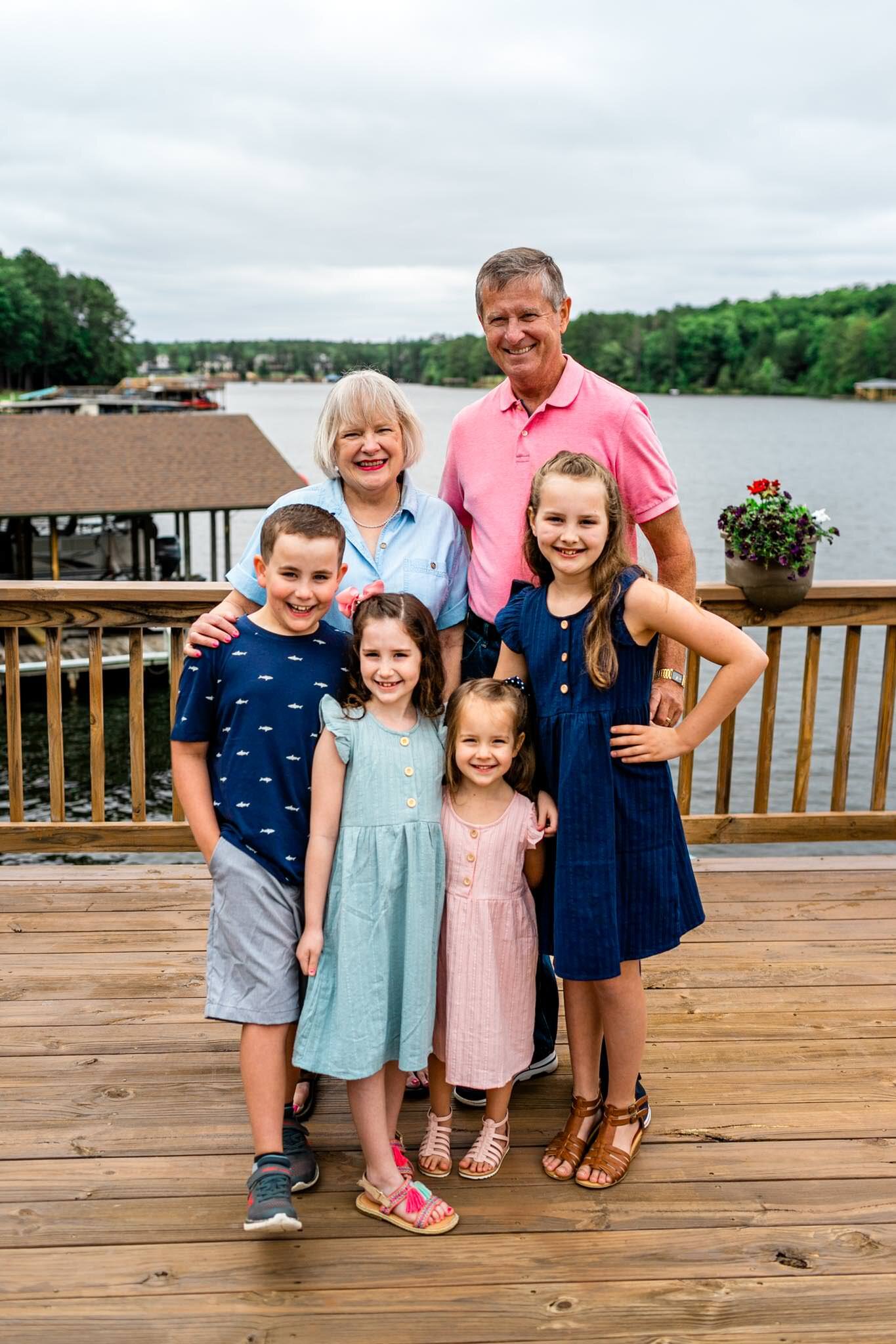 Lake Gaston Family Photographer | By G. Lin Photography | Four children standing with grandparents