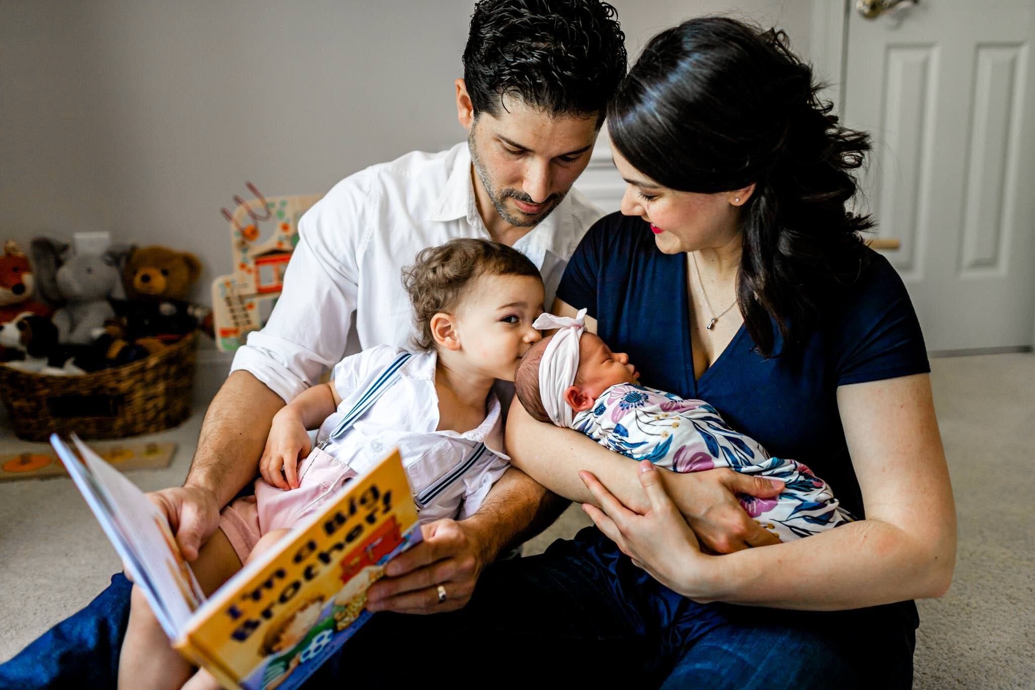 Toddler boy kissing baby sister | Durham Newborn Photographer | By G. Lin Photography