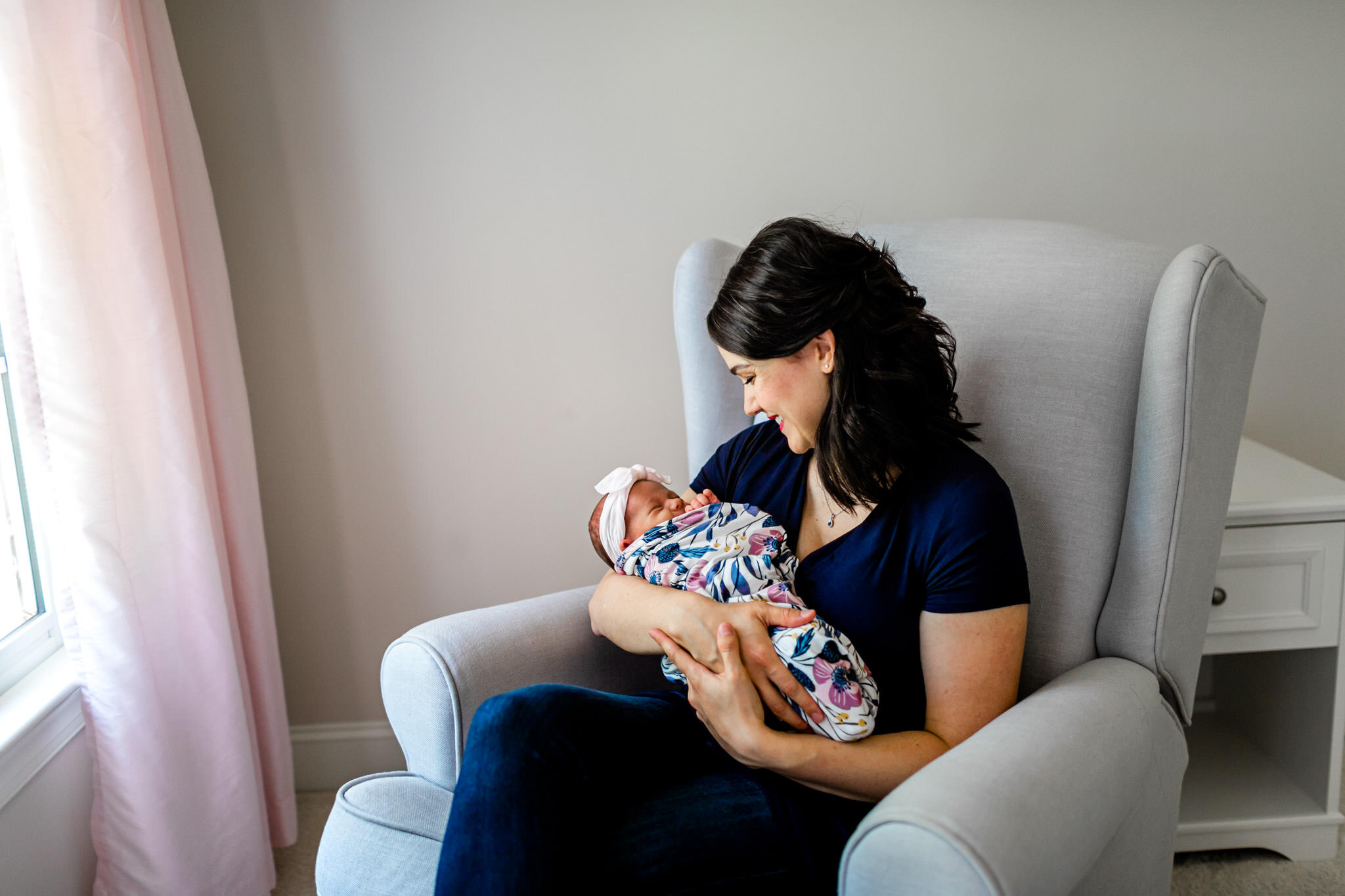 Durham Newborn Photographer | By G. Lin Photography | Lifestyle newborn photos at home | Mother holding baby girl