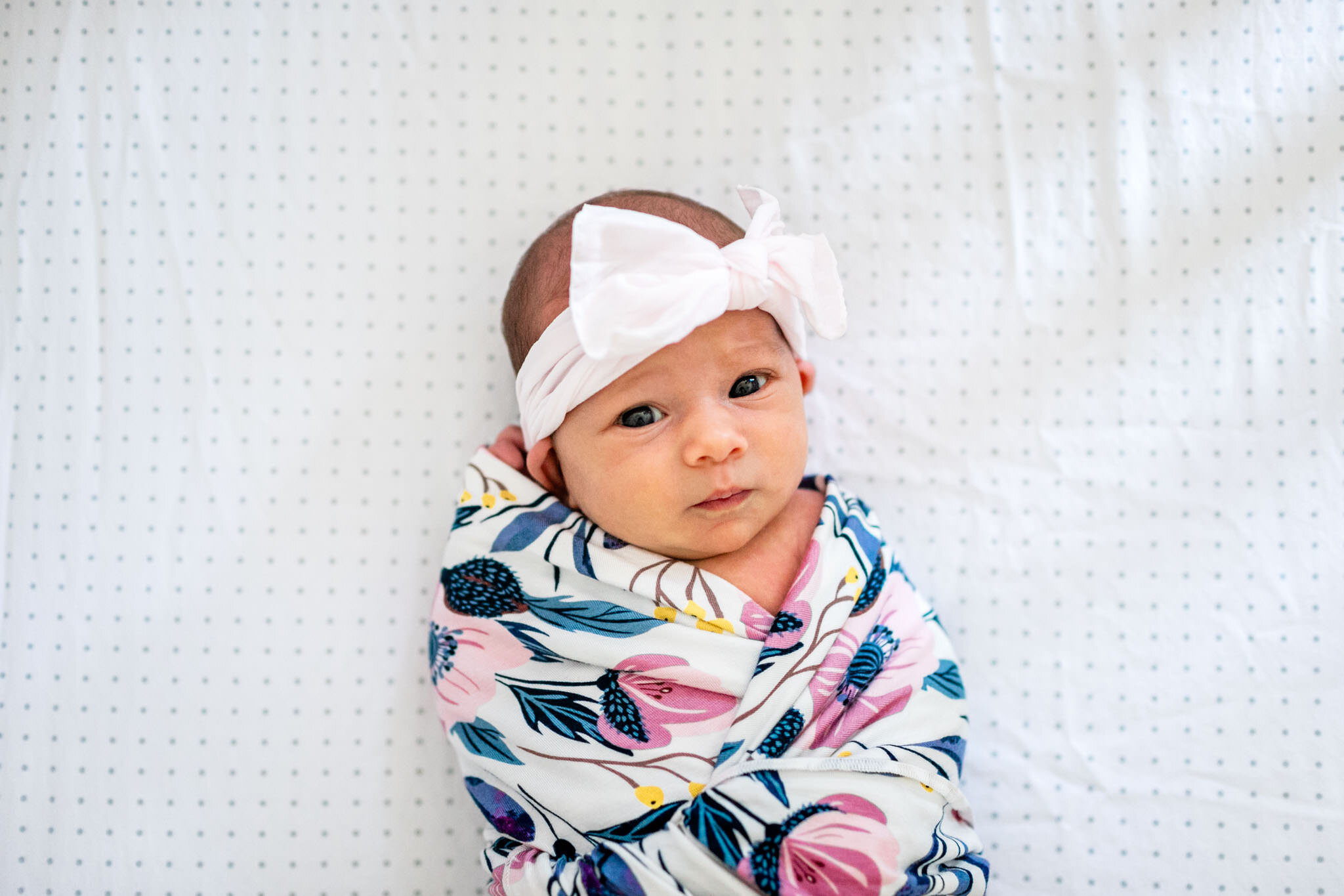 Durham Newborn Photographer | By G. Lin Photography | Portrait of baby girl swaddled in floral print