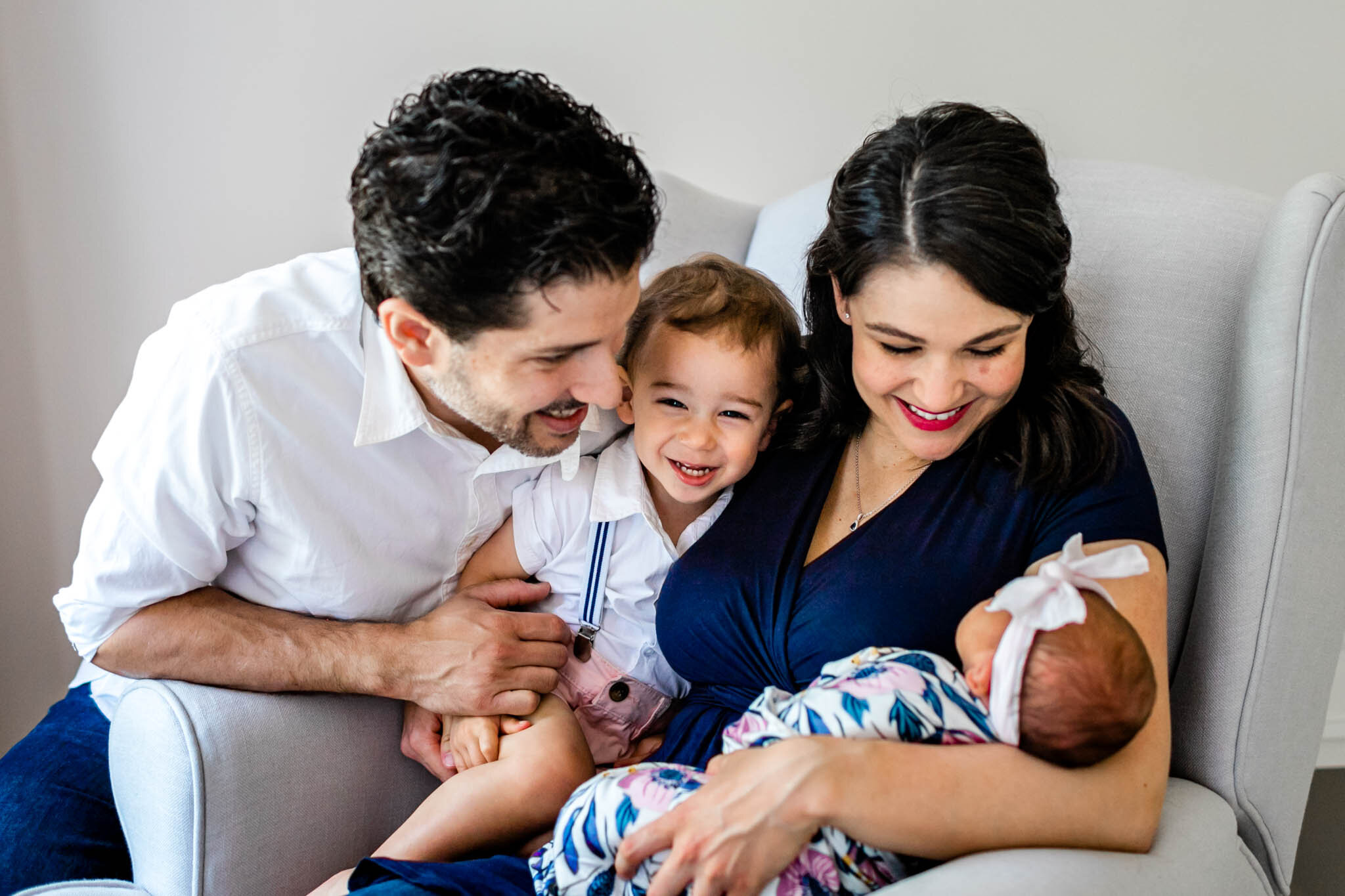 Boy laughing during lifestyle newborn session | Durham Newborn Photographer | By G. Lin Photography