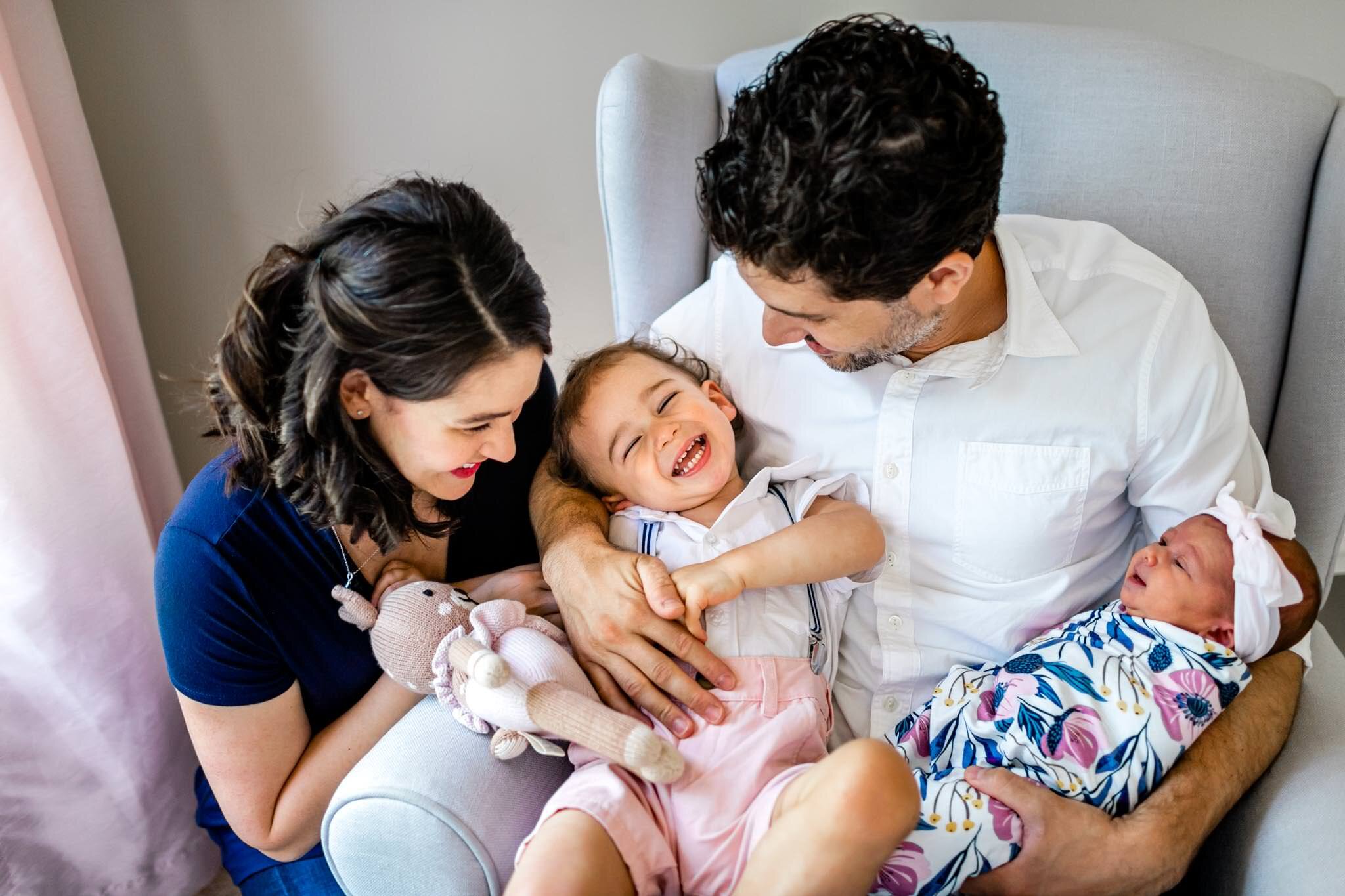 Durham Newborn Photographer | By G. Lin Photography | Child laughing with parents | Lifestyle family photography at home