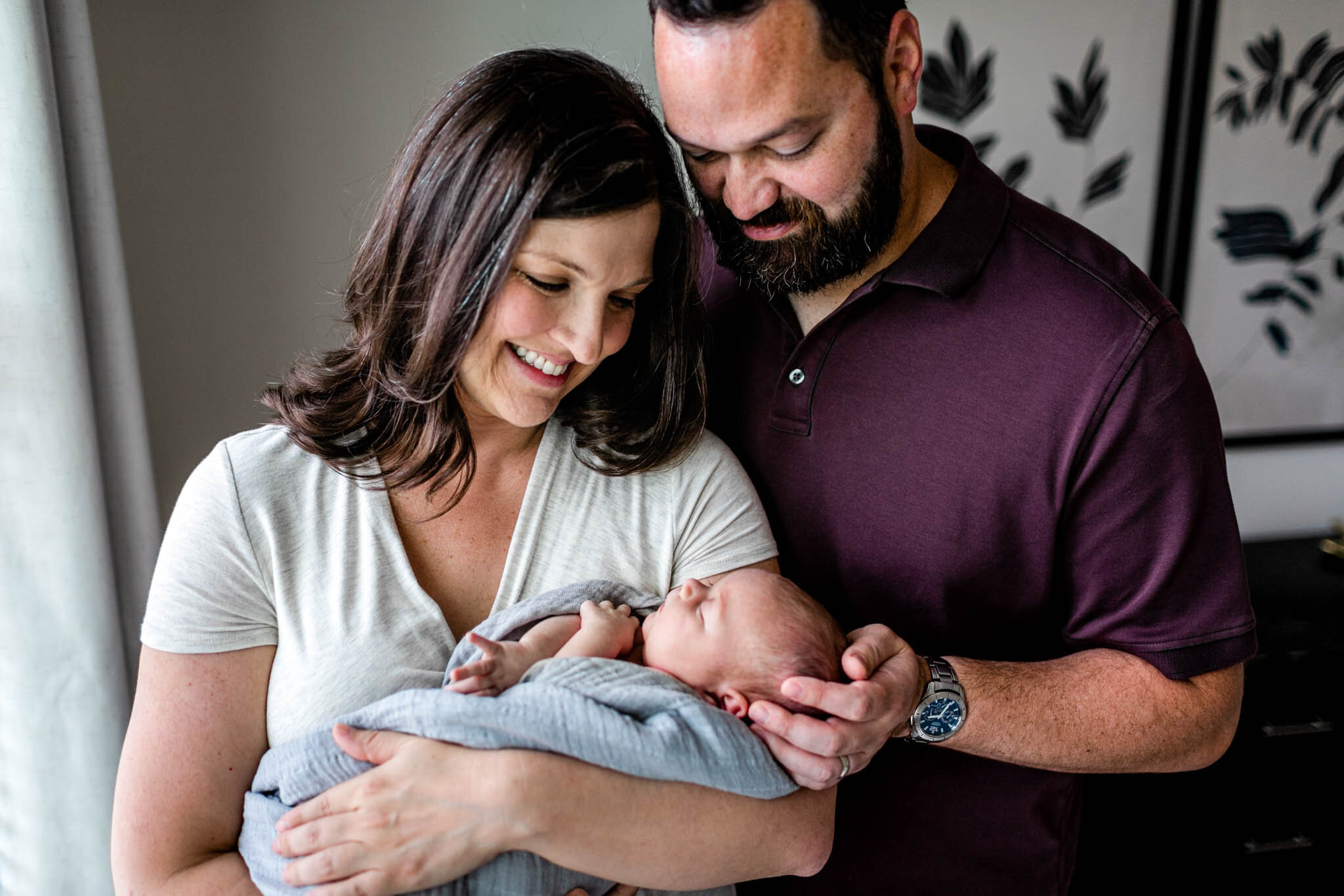 Mother and father holding baby | Durham Newborn Photographer | By G. Lin Photography