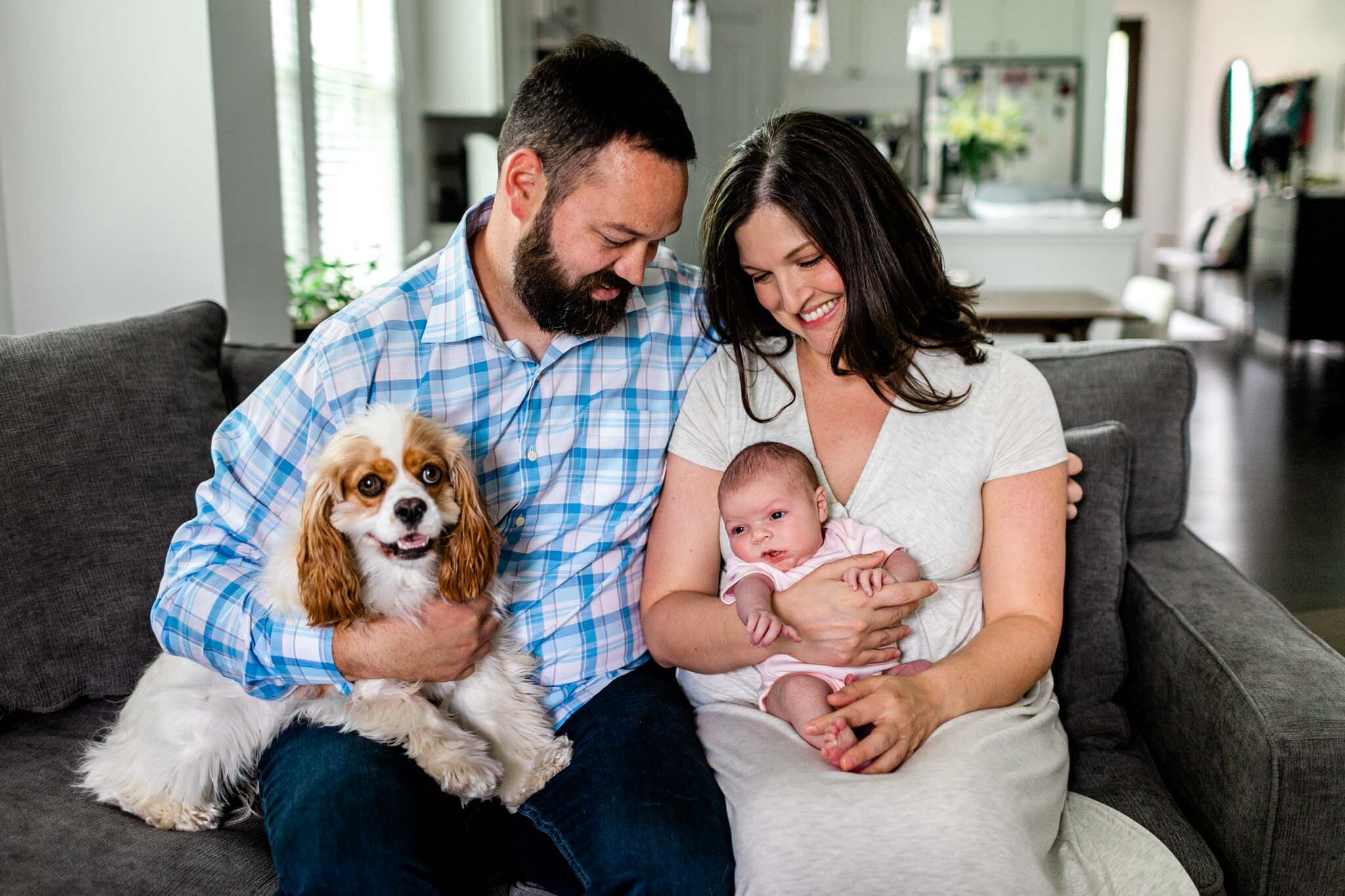 Durham Newborn Photographer | By G. Lin Photography | Family sitting on couch with dog and baby
