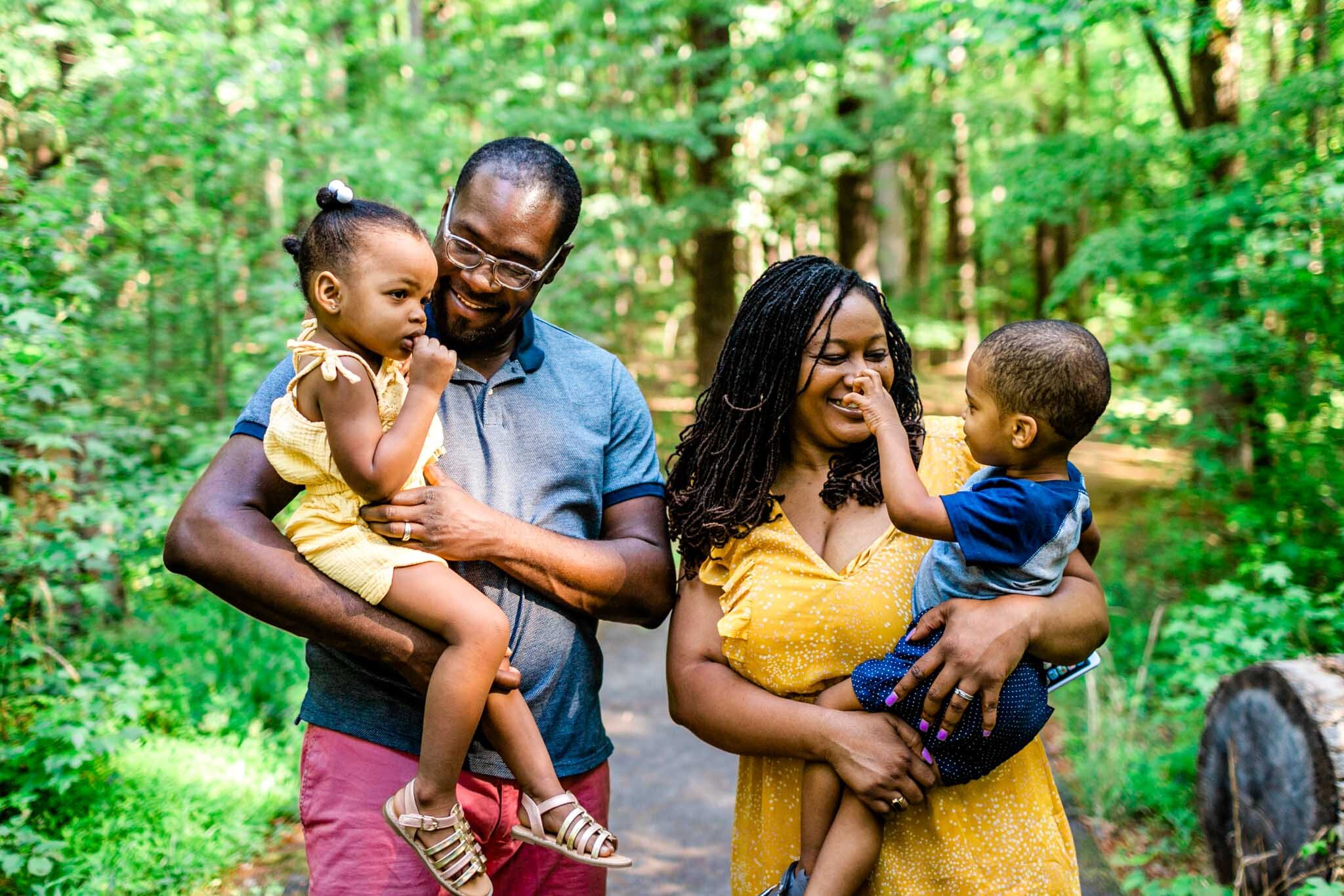 Raleigh Family Photographer | By G. Lin Photography | Umstead Park | Parents holding children