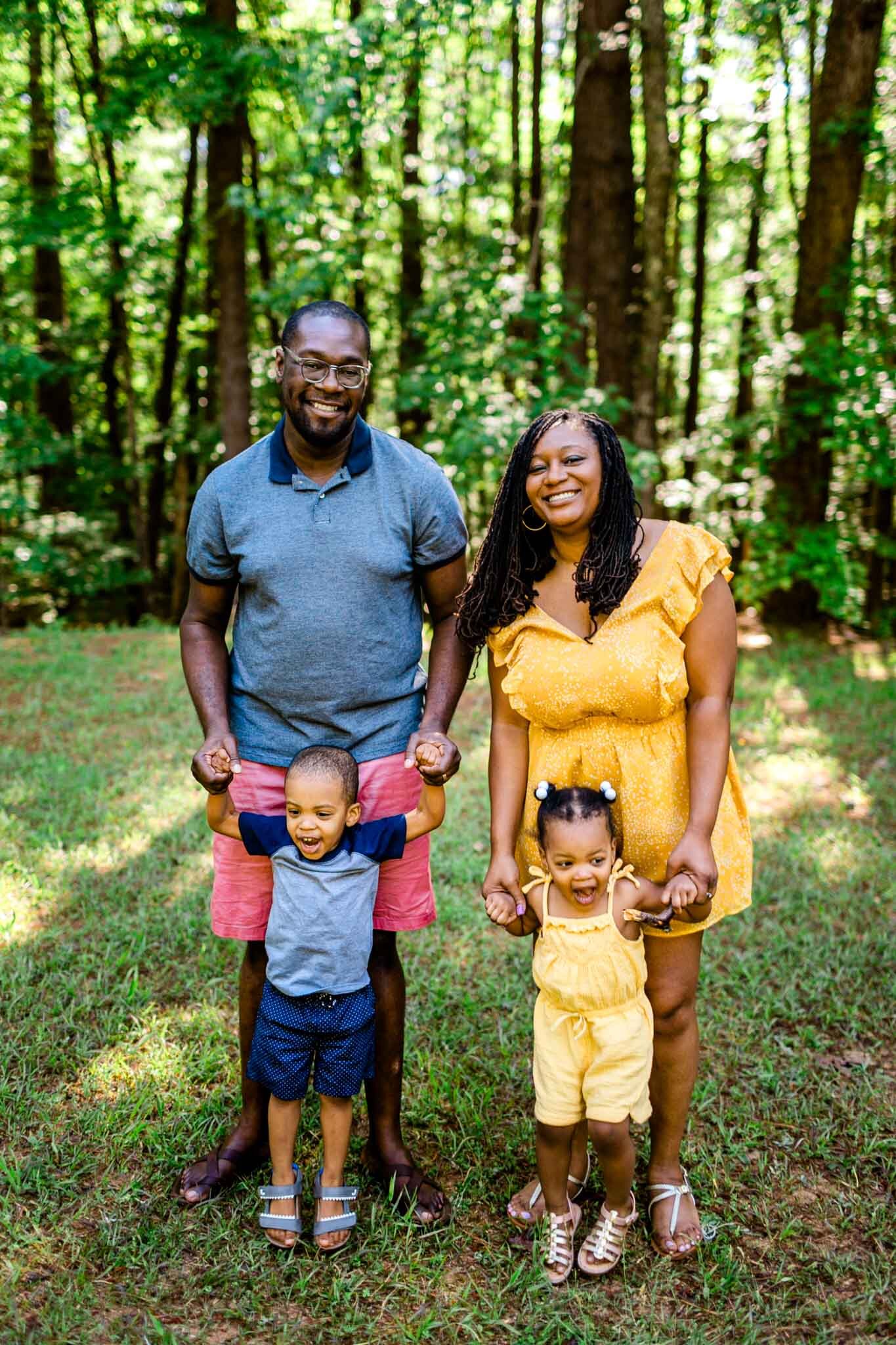 Spring family photo outside in forest | Raleigh Family Photographer | By G. Lin Photography | Umstead Park