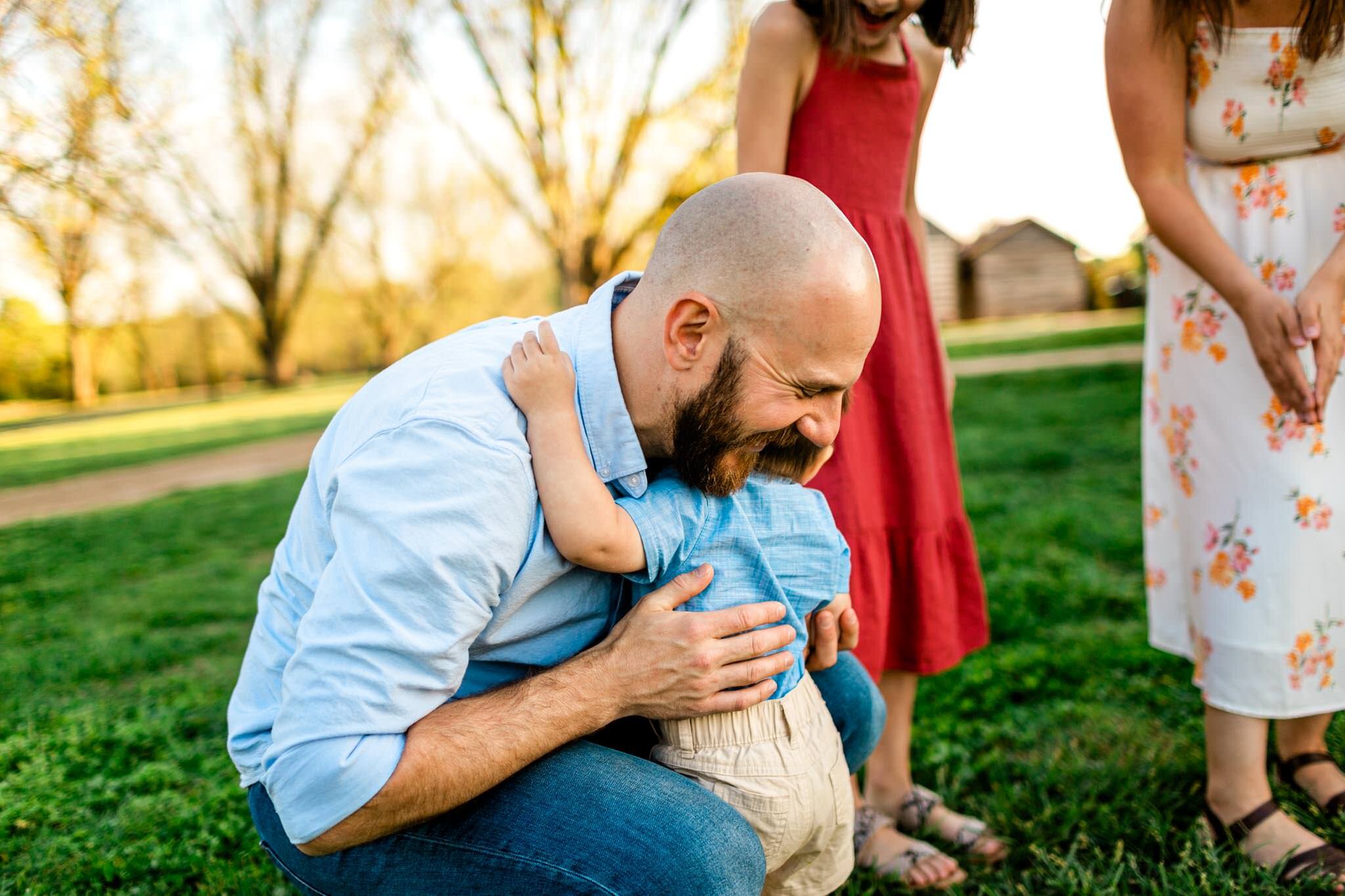 Raleigh Family Photographer | Joyner Park | By G. Lin Photography | Dad embracing son