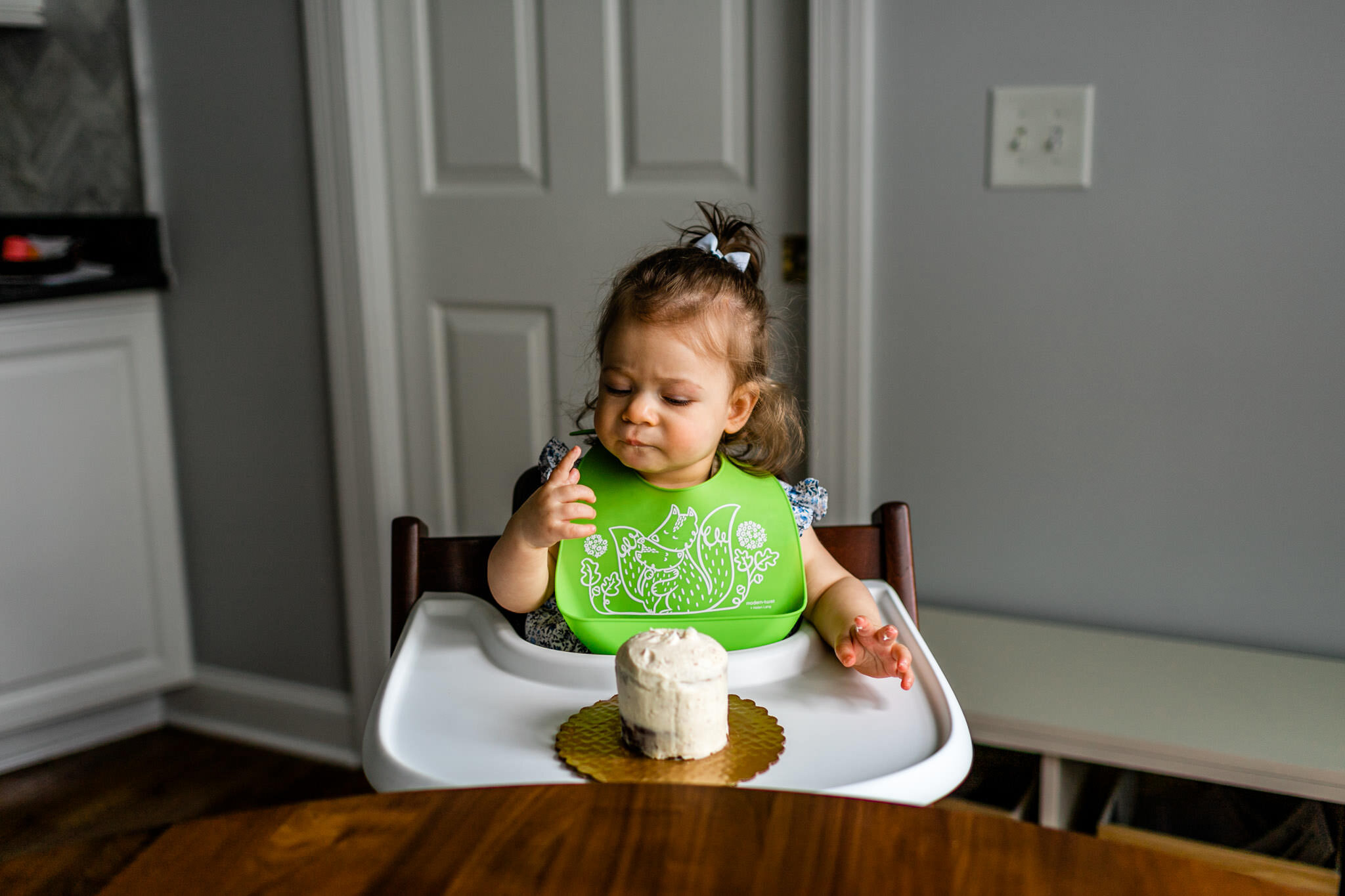 Durham Family Photographer | By G. Lin Photography | Baby girl examining cake piece