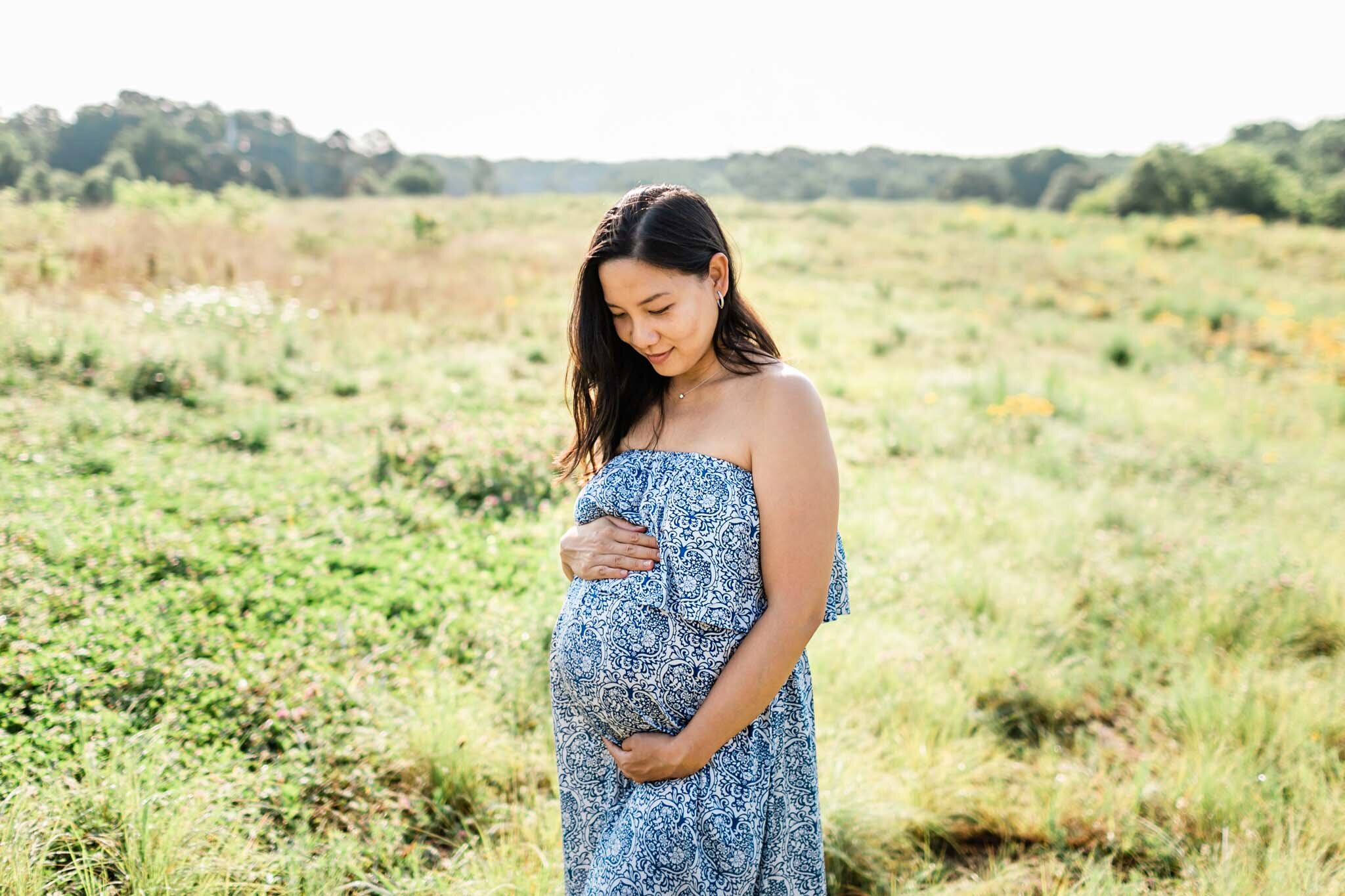 Raleigh Maternity Photographer | By G. Lin Photography | NCMA Maternity Photos | Pregnant woman standing in open field