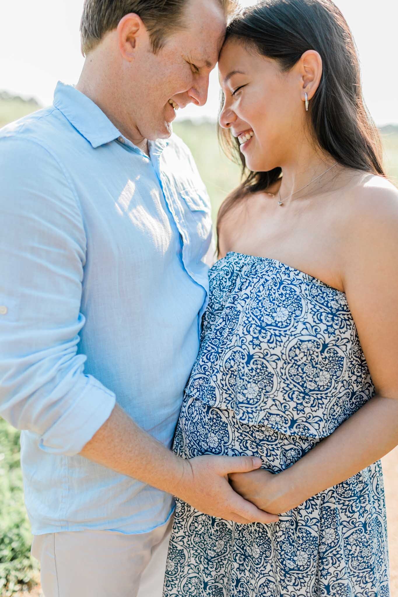 Raleigh Maternity Photographer | By G. Lin Photography | NCMA Maternity Photos | Happy couple holding baby bump