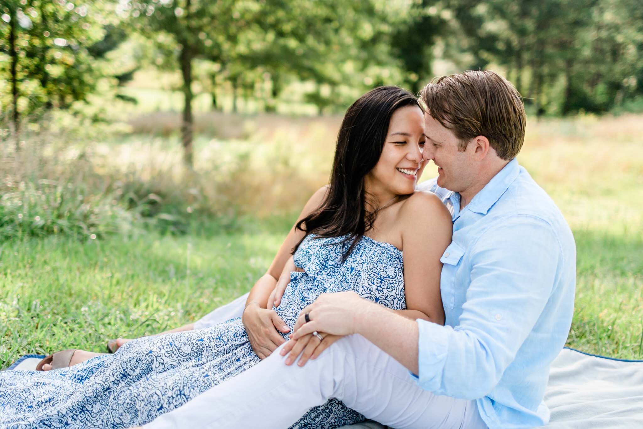 Raleigh Maternity Photographer | By G. Lin Photography | NCMA Maternity Photos | Man and woman sitting on blanket