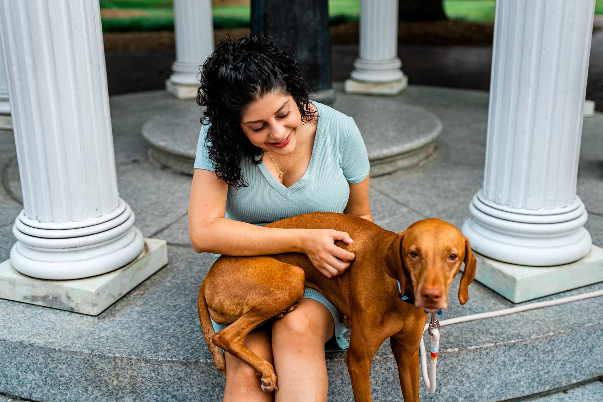 UNC Chapel Hill Maternity Photography | By G. Lin Photography | Woman sitting down with dog