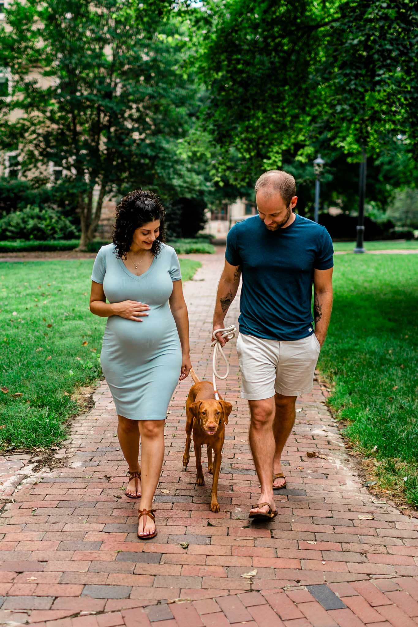 UNC Chapel Hill Maternity Photography | By G. Lin Photography | Woman and man walking dog