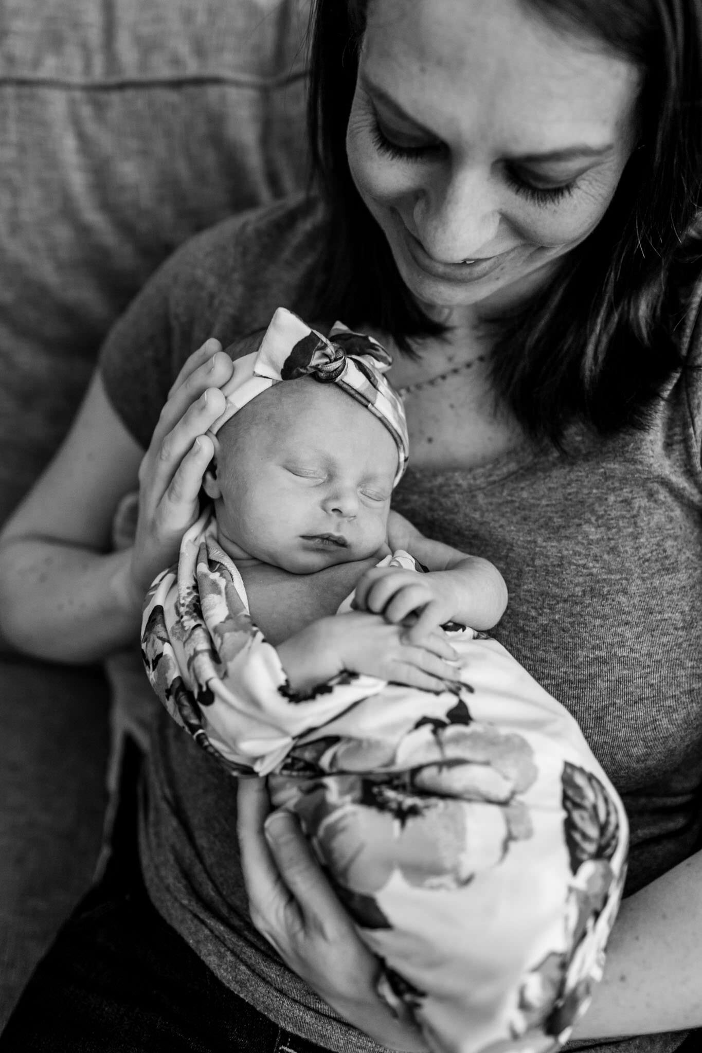 Hillsborough Newborn Photographer | By G. Lin Photography | Black and white photo of mother holding baby