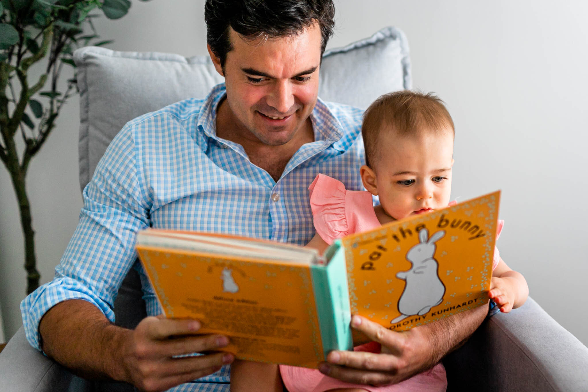 Lifestyle Durham Family Photographer | By G. Lin Photography | Dad reading book to baby