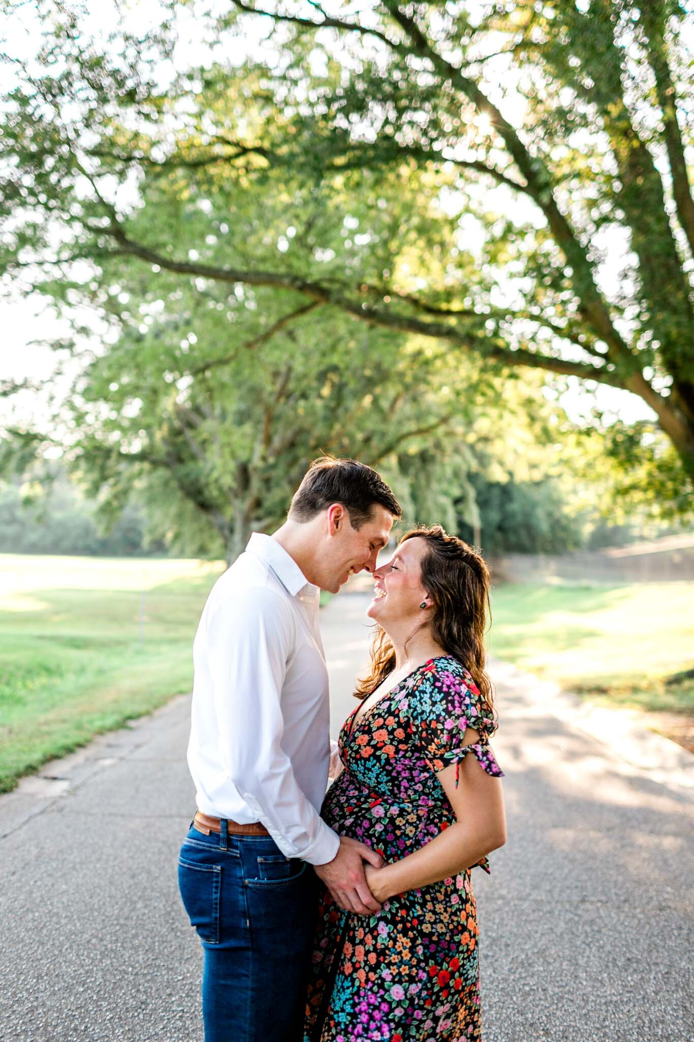 Raleigh Maternity Photographer | Dix Park | By G. Lin Photography | Man and woman standing face to face