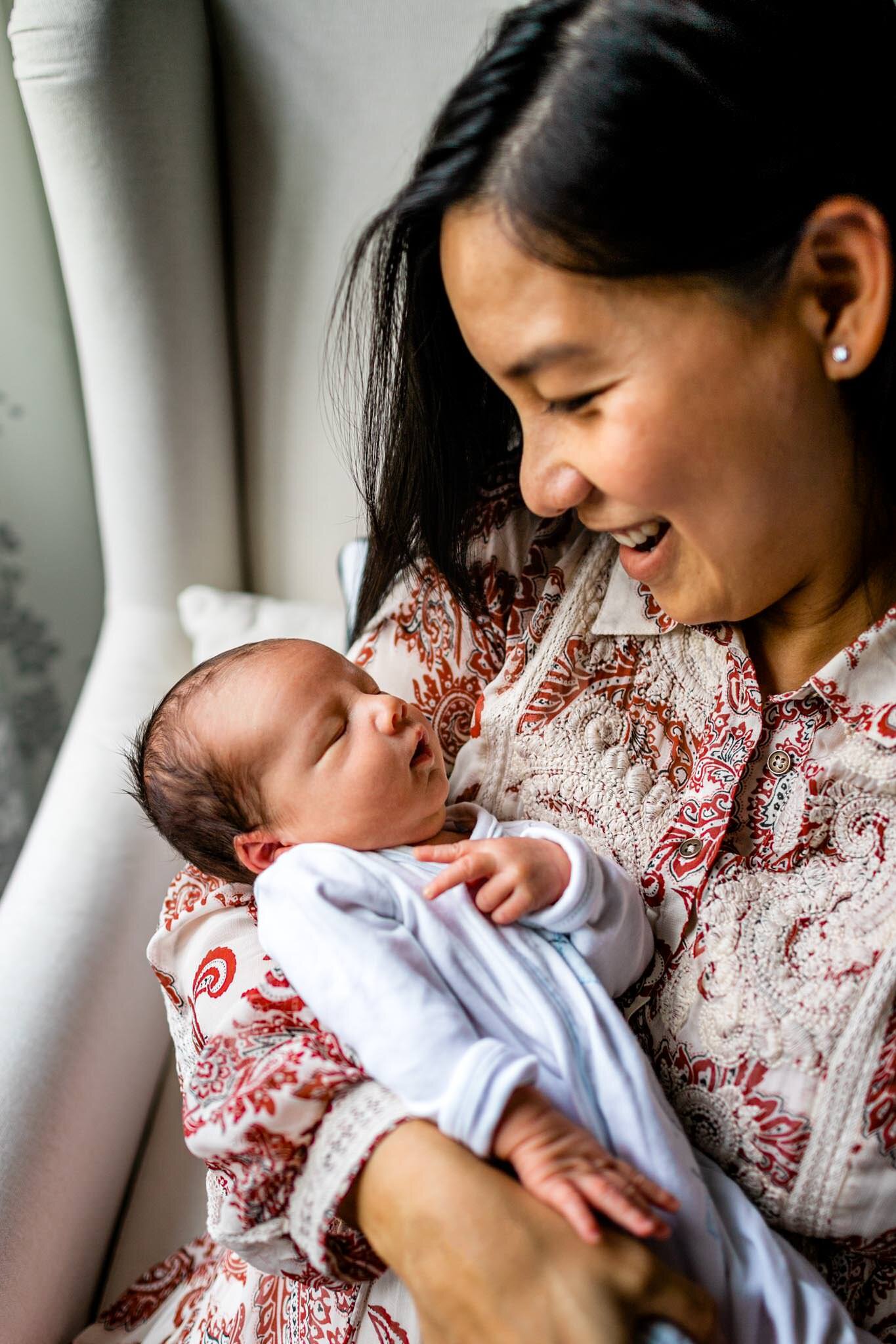 Pittsboro Newborn Photographer | By G. Lin Photography | Mother holding newborn baby
