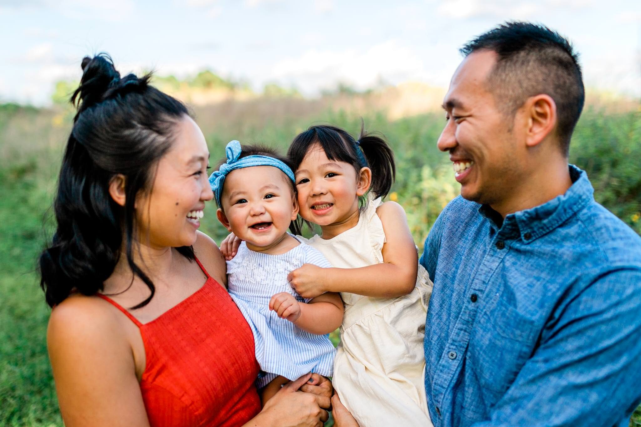 Raleigh Family Photographer | By G. Lin Photography | Candid shot of family laughing