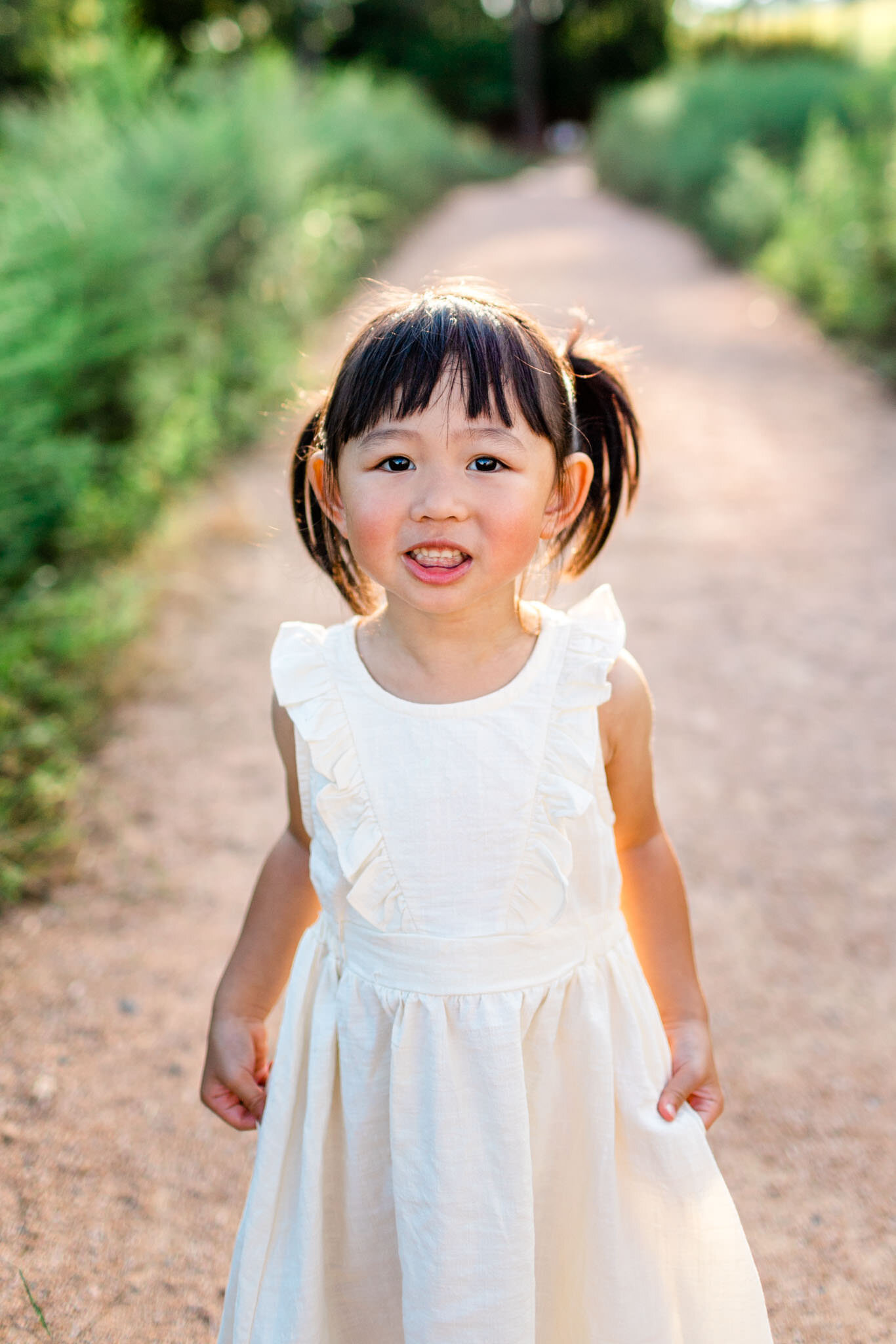 Raleigh Family Photographer | By G. Lin Photography | Toddler girl smiling at camera