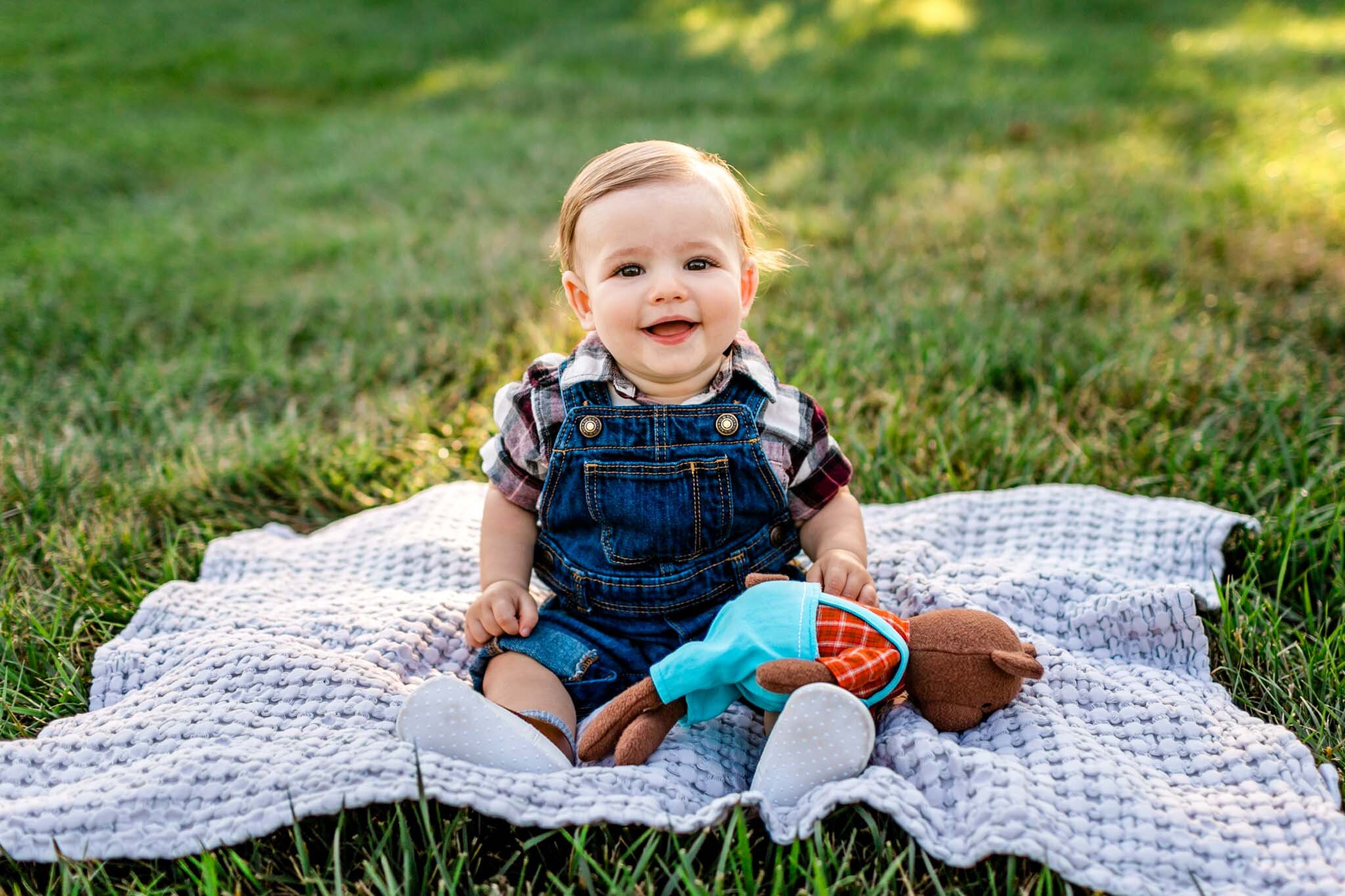 Durham Family Photographer | By G. Lin Photography | Baby boy sitting on blanket and smiling