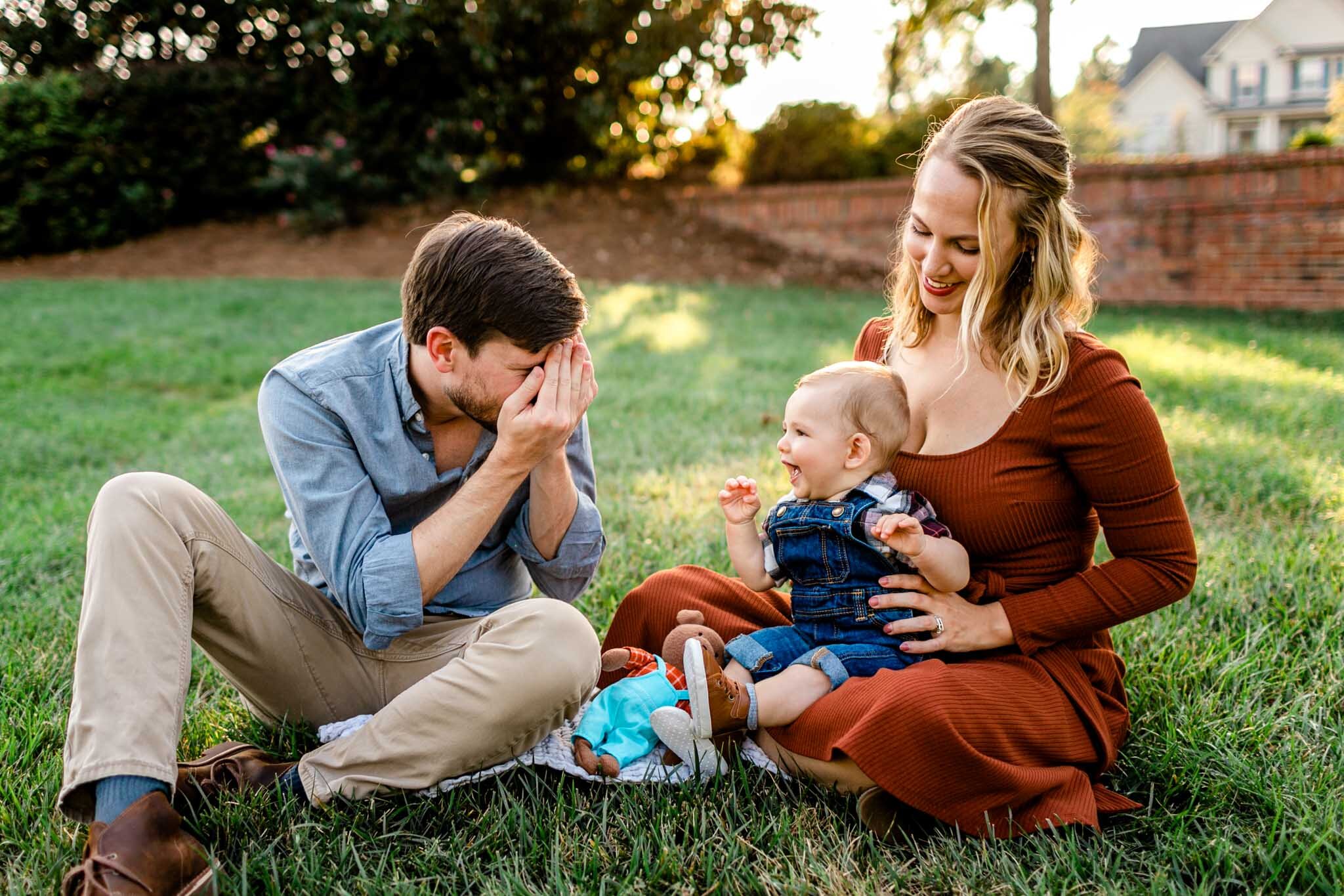 Durham Family Photographer | By G. Lin Photography | Mom and dad sitting on blanket with baby