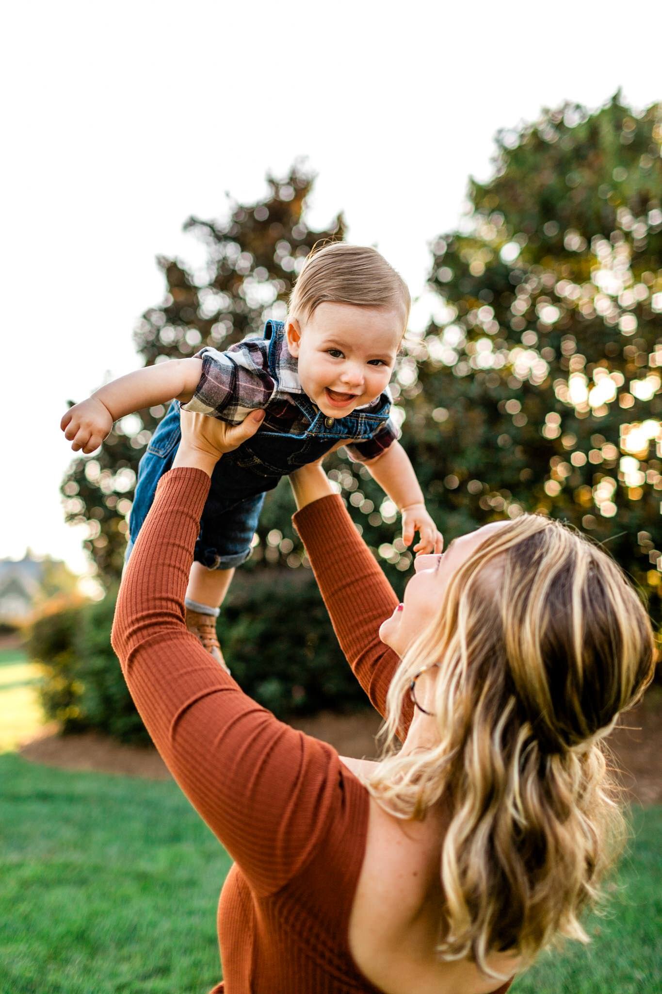 Durham Family Photographer | By G. Lin Photography | Mom throwing baby in the air