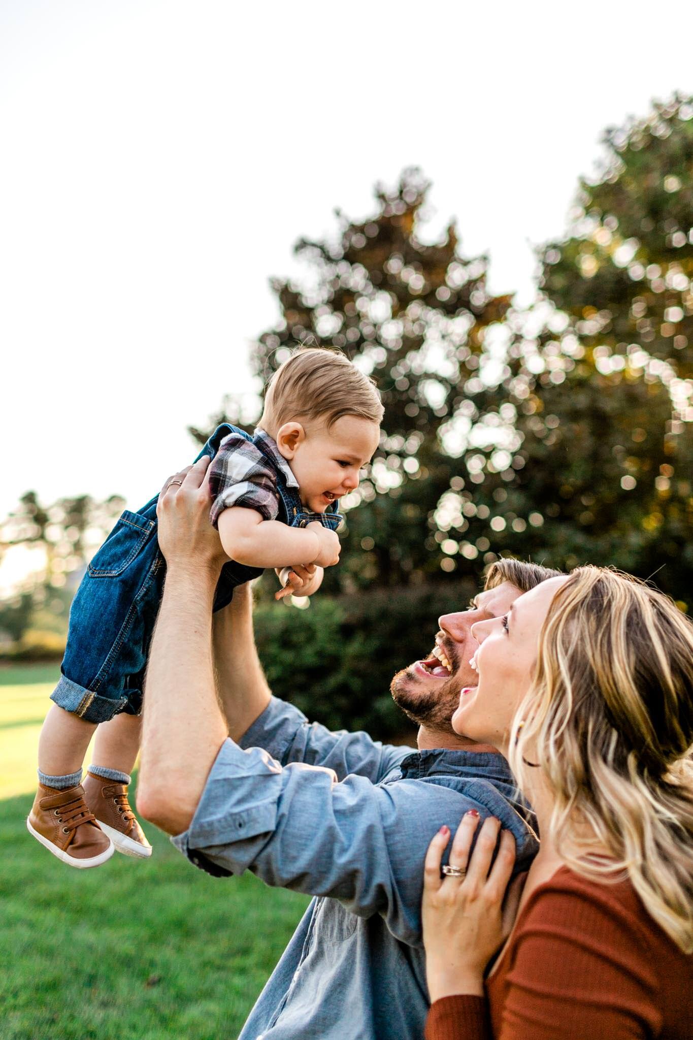 Durham Family Photographer | By G. Lin Photography | Father holding baby in the air