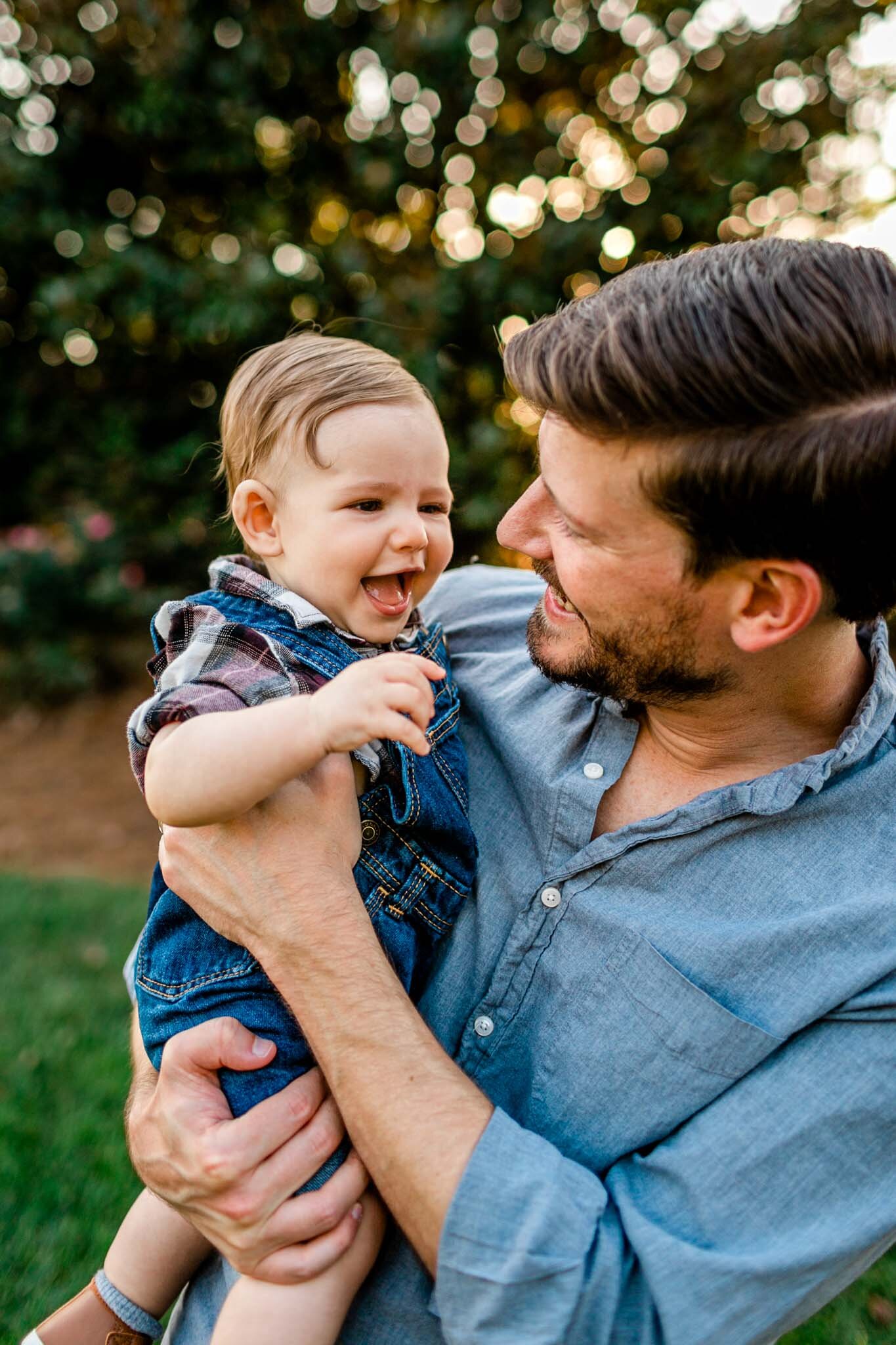 Durham Family Photographer | By G. Lin Photography | Father holding baby boy in arms