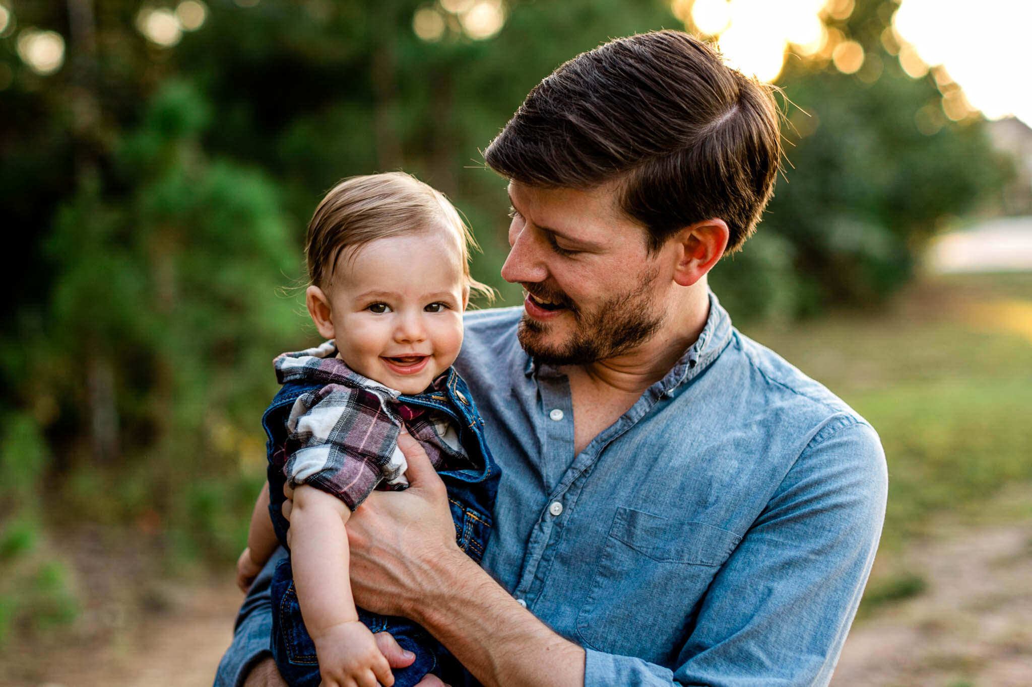Durham Family Photographer | By G. Lin Photography | Father holding baby and smiling