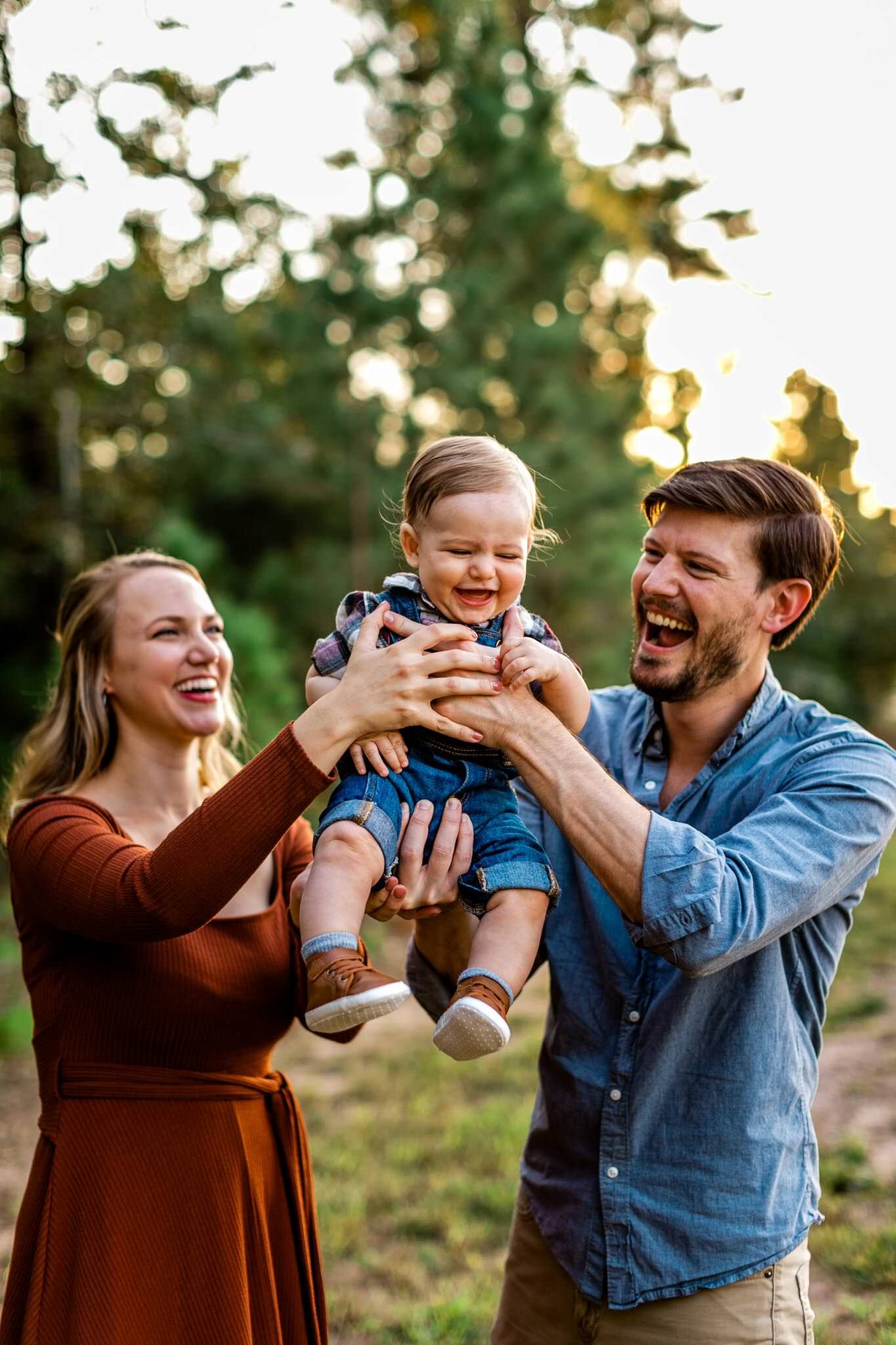 Durham Family Photographer | By G. Lin Photography | Baby boy laughing while being held by parents
