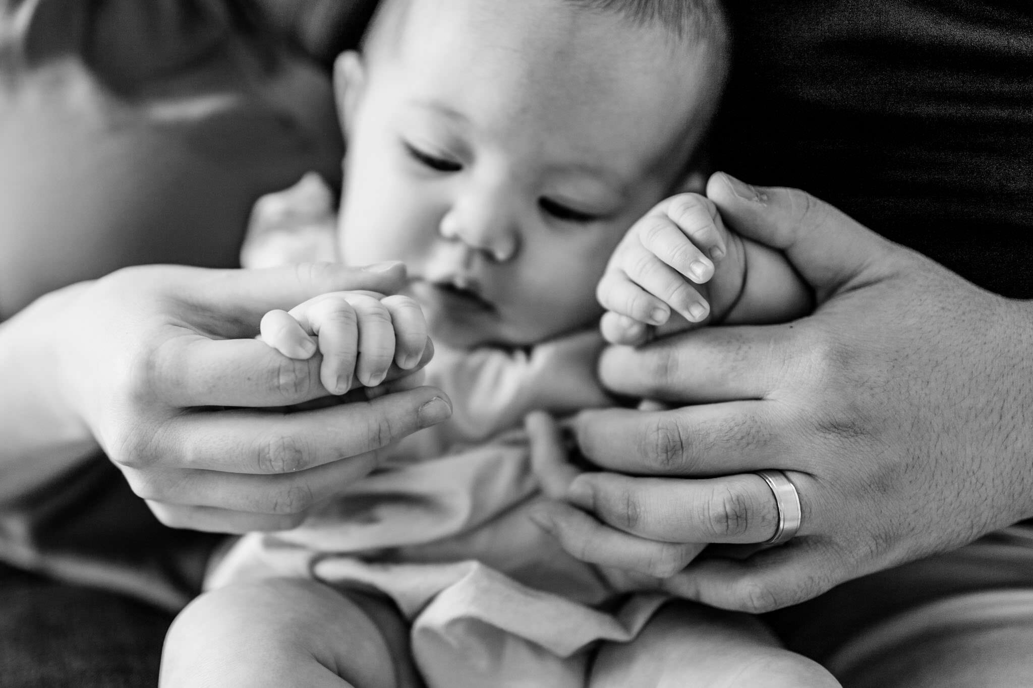 Raleigh Family Photographer | By G. Lin Photography | Black and white photo of baby's hands