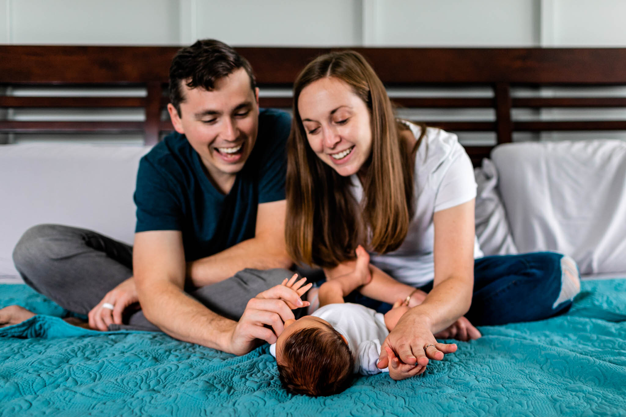 Durham Newborn Photographer | By G. Lin Photography | Man and woman smiling at baby 