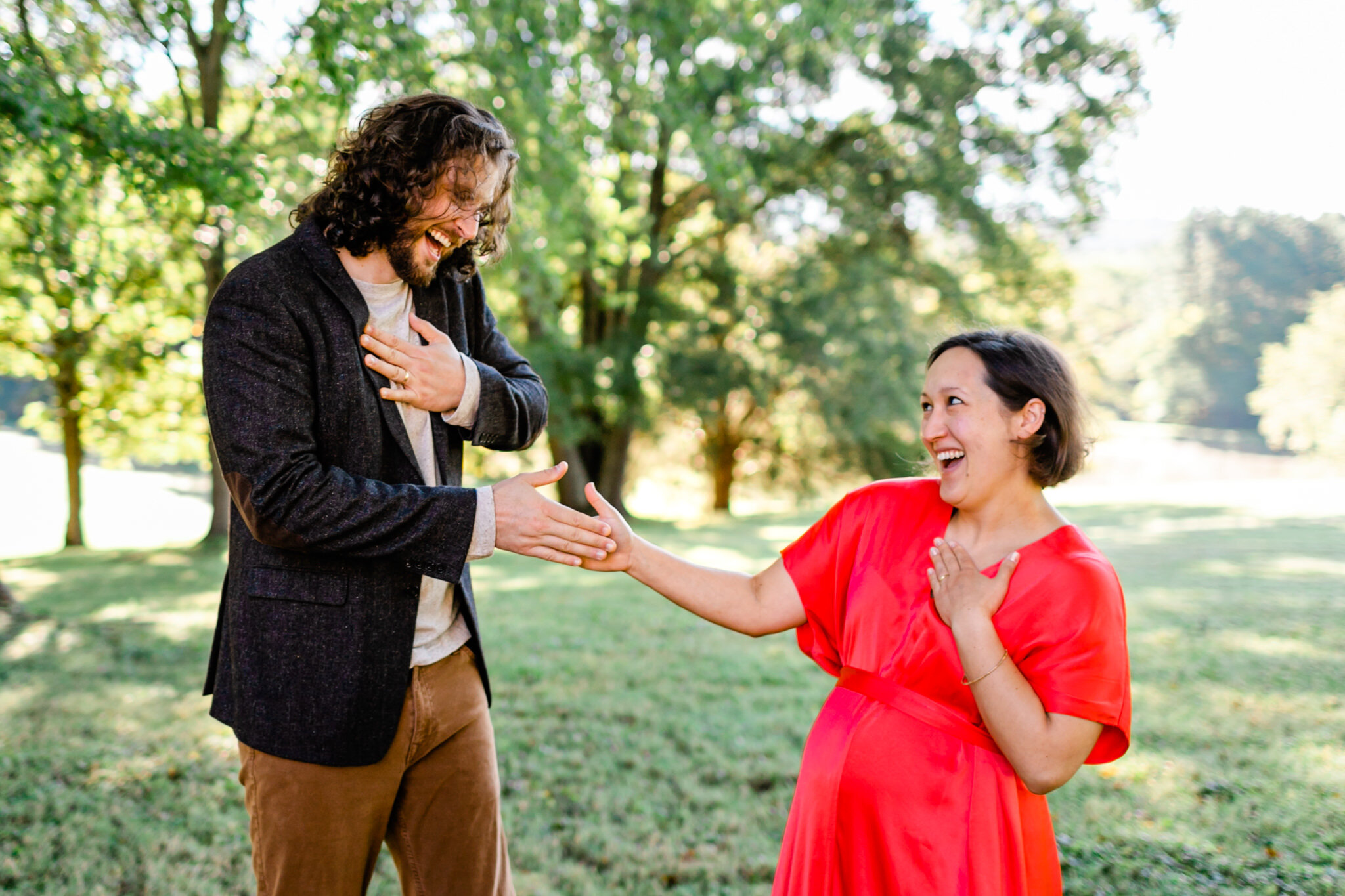 Maternity Shoot at Ayr Mount | Hillsborough Maternity Photographer | By G. Lin Photography | Man and woman giving handshake to each other