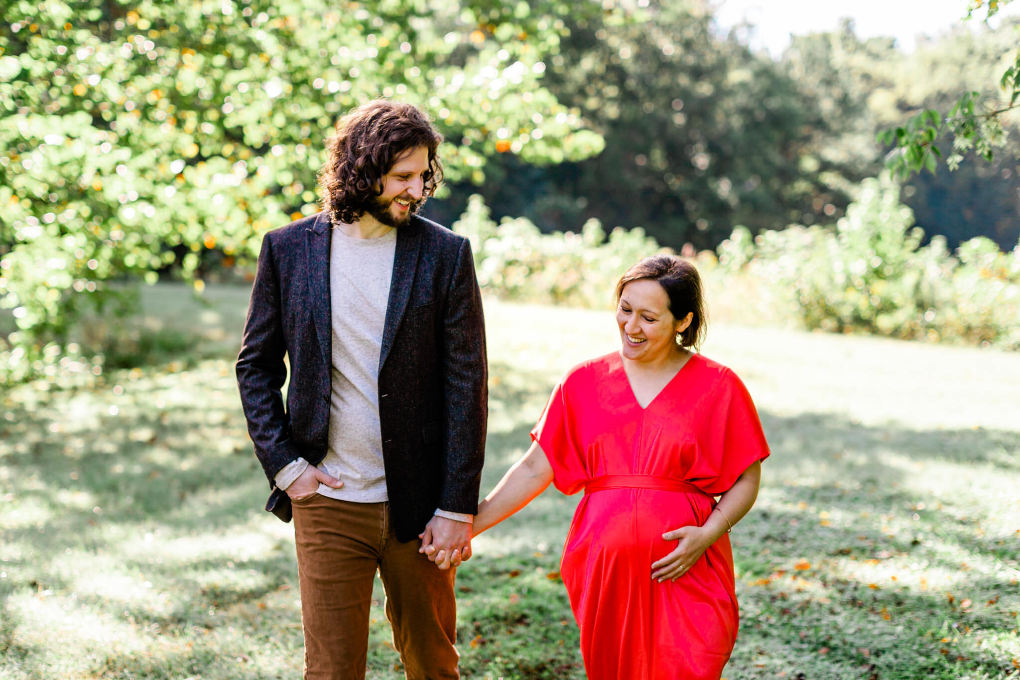 Maternity Shoot at Ayr Mount | Hillsborough Maternity Photographer | By G. Lin Photography | Man and woman walking in grassy field