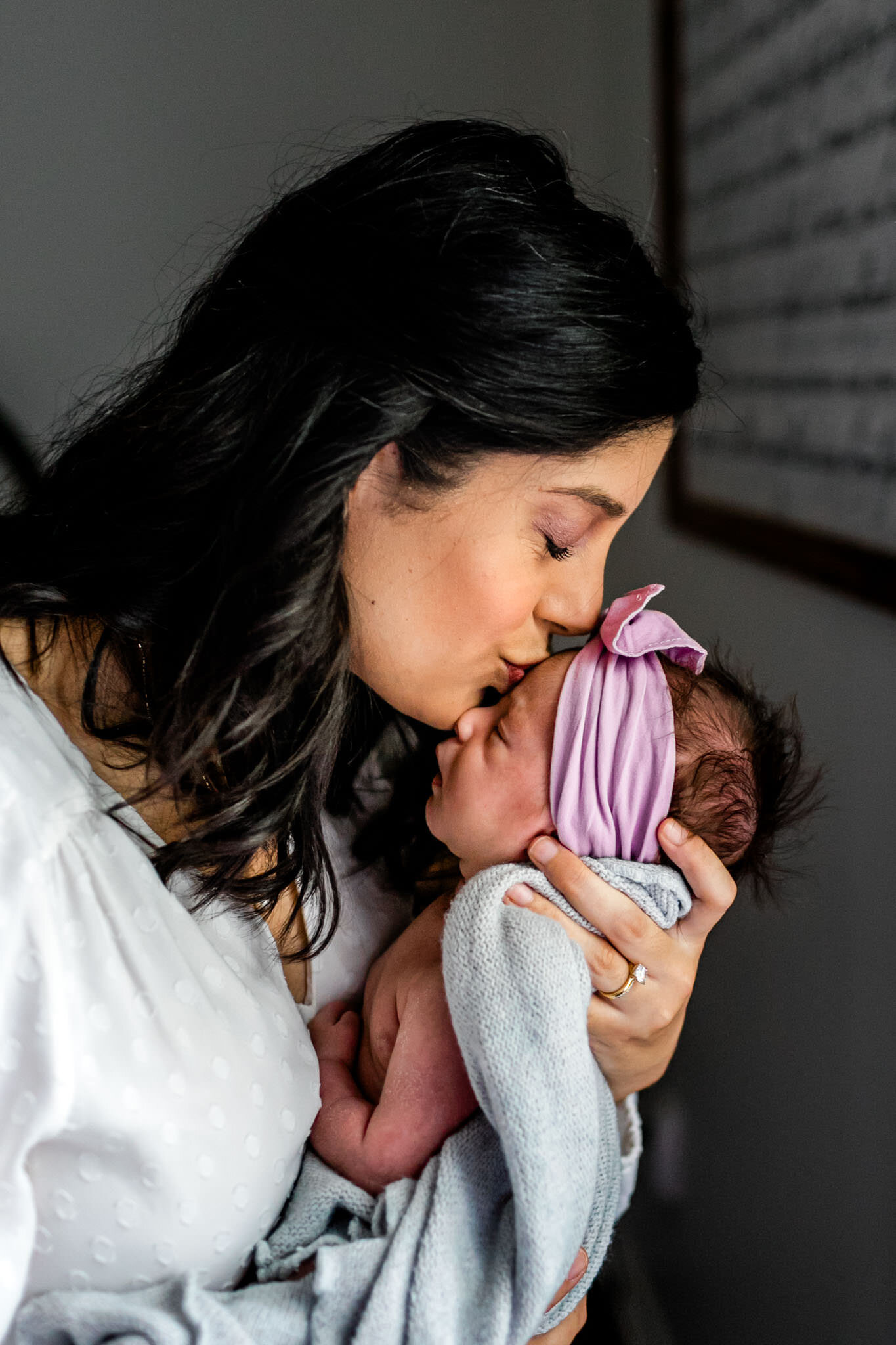 Charlotte Newborn Photographer | By G. Lin Photography | Mother kissing baby girl