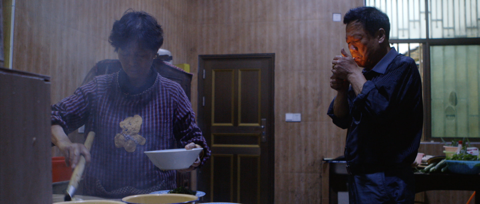 The president and his wife in their kitchen.