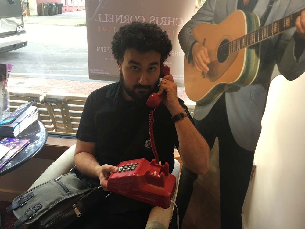 trolling twitter with a phone that looks like the stage phone a little before the show