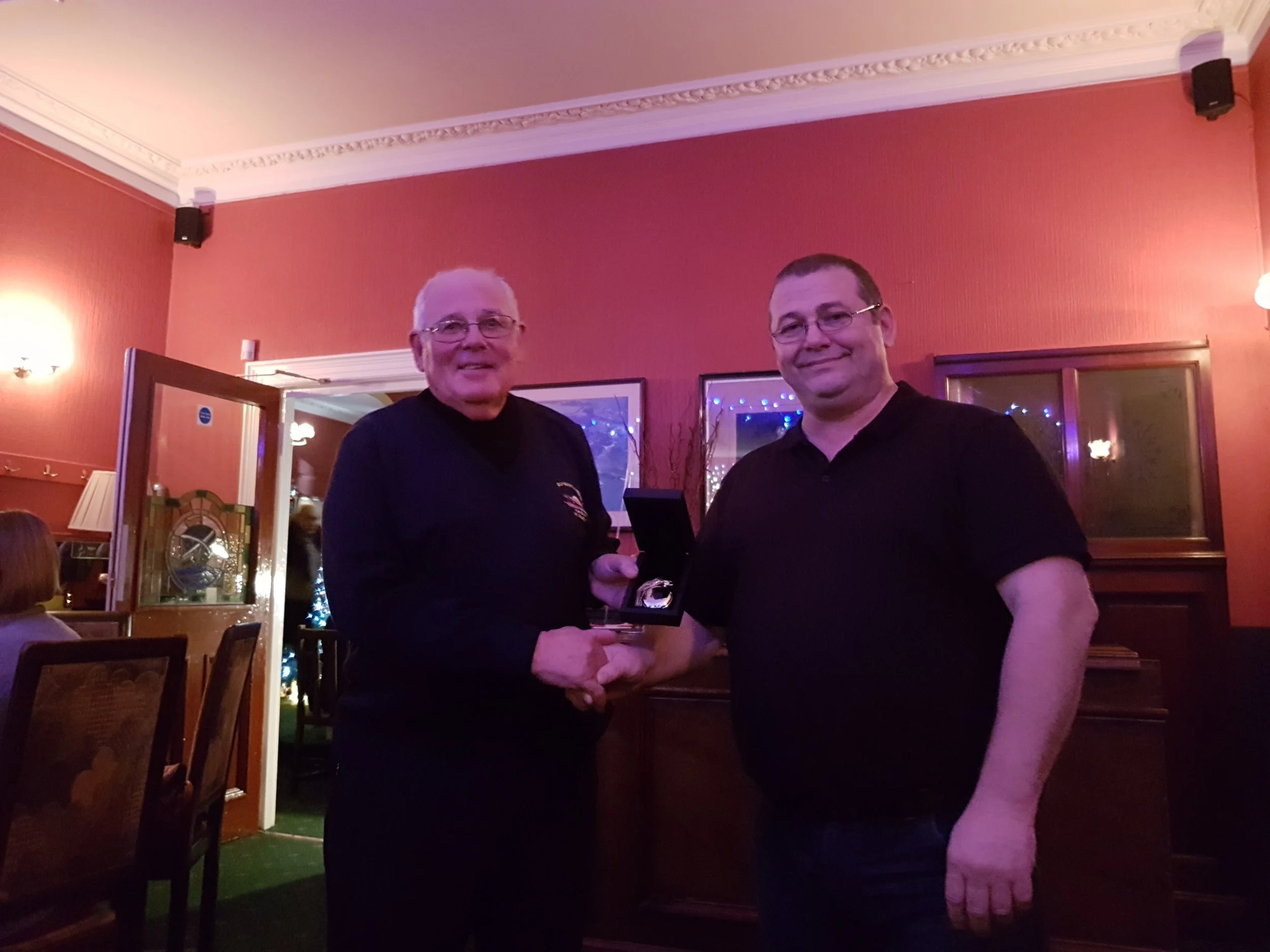 Coxswain Gary Fairbairn presents Mike with his gift and thanks him for his time and work over the years. 