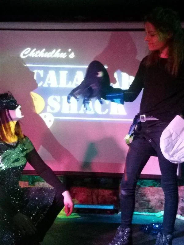 Photo by Anjali Ramachandran. LJ as amateur astronomer T heriomorph (left), Leila as sea-food chef SEO expert C hthulhu (right)