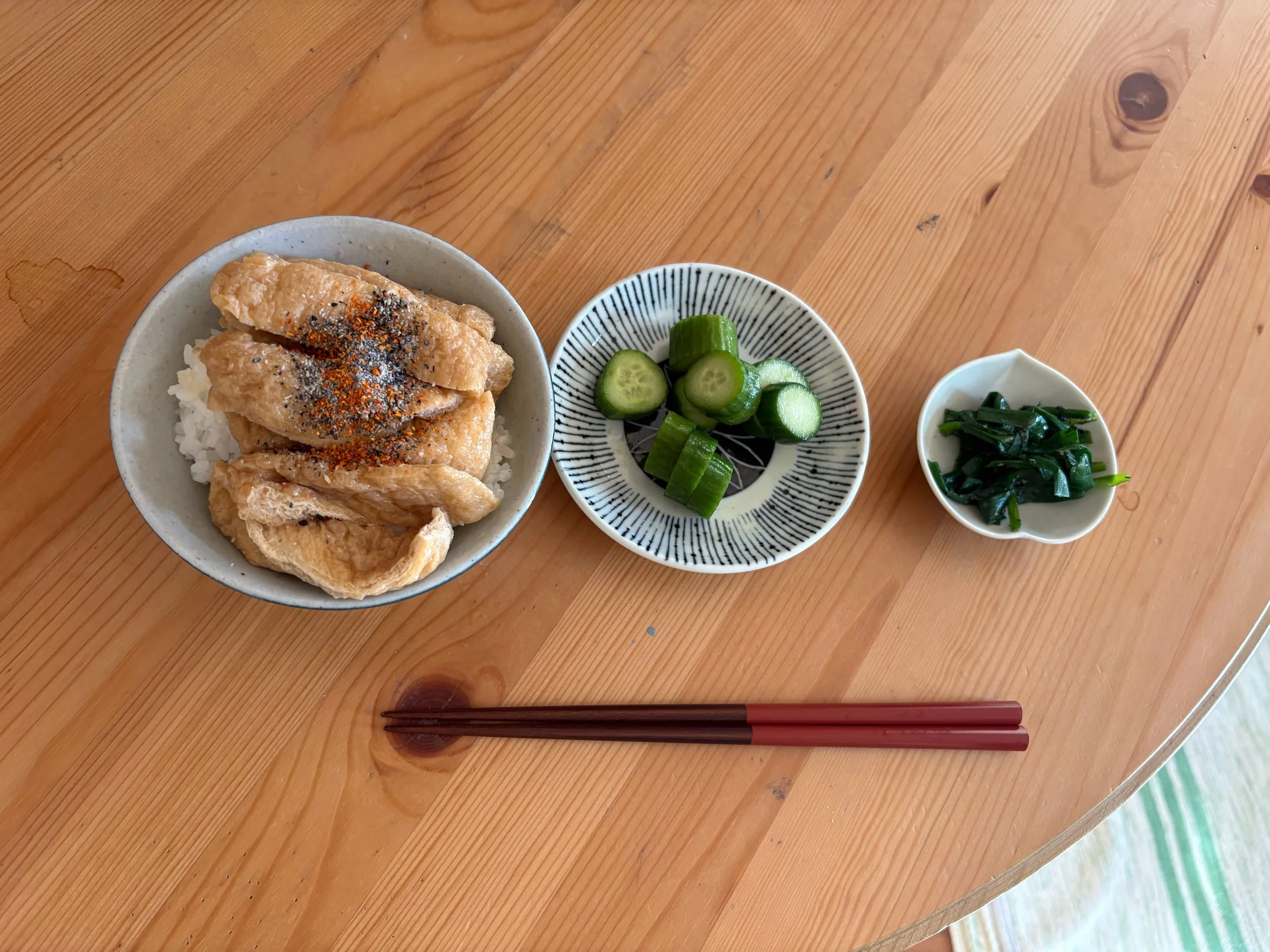 the Japan!( tofu skin over rice, cucumber pickles, leek with dashi brooth) 