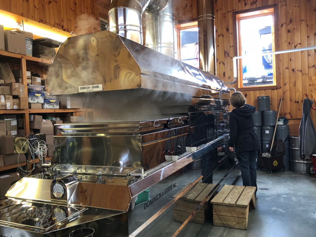 The product offerings and evaporator at Morning Star Maple. &nbsp;The steam from the sap literally streams directly out an opening in the roof!
