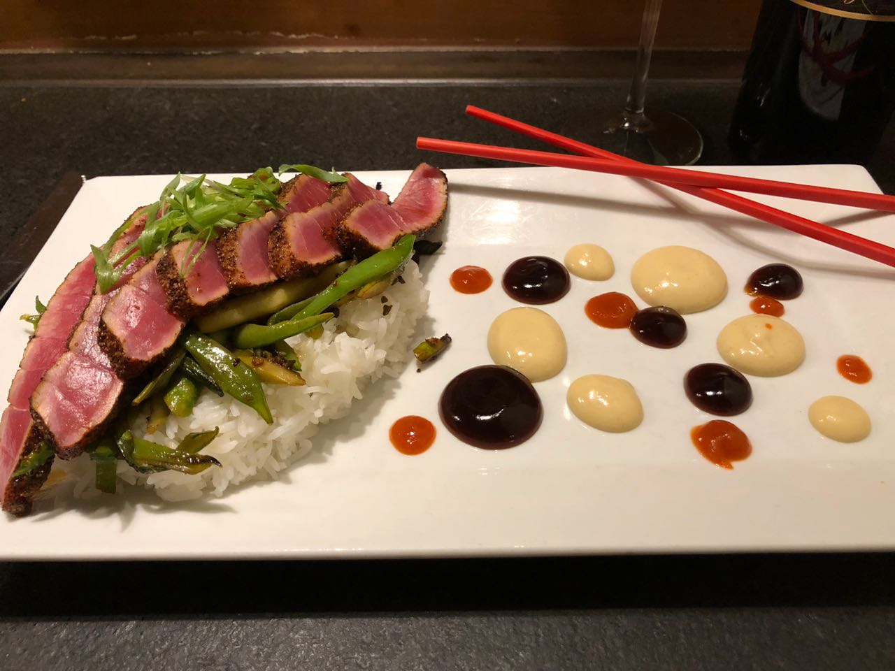 Chili and Sumac Crusted Ahi Tuna with Jasmine Rice, Spring Veggies and Three Sauces