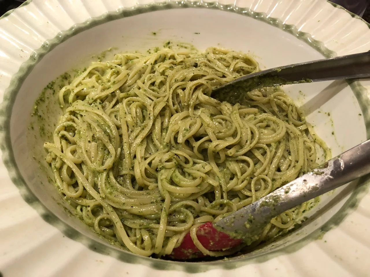 mixing the pasta and pesto