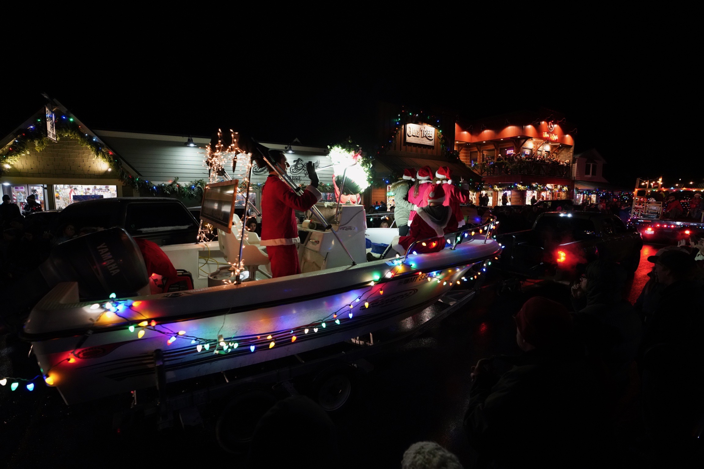 A crowd gathers on a temperate December night for the Annual Bigfork, MT. Christmas Parade.