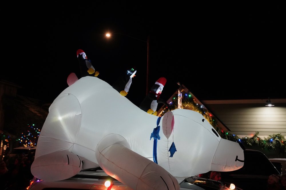 A crowd gathers on a temperate December night for the Annual Bigfork, MT. Christmas Parade.