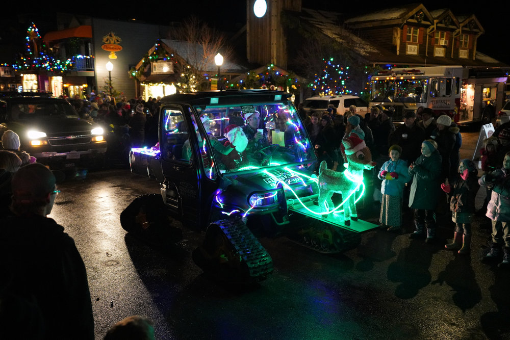 A crowd gathers on a temperate December night for the Annual Bigfork, MT. Christmas Parade.