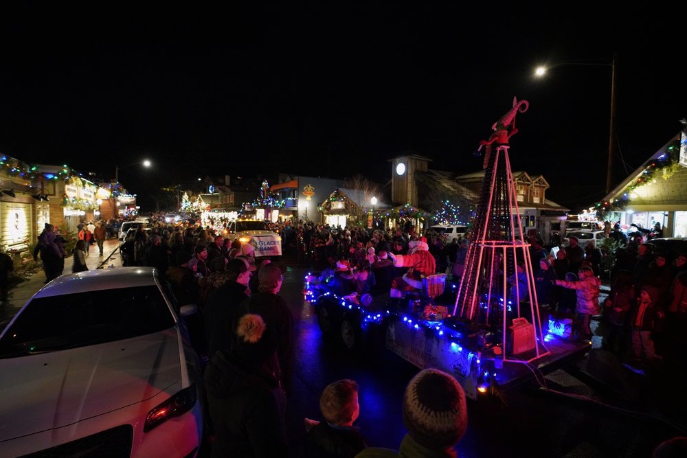 A crowd gathers on a temperate December night for the Annual Bigfork, MT. Christmas Parade.