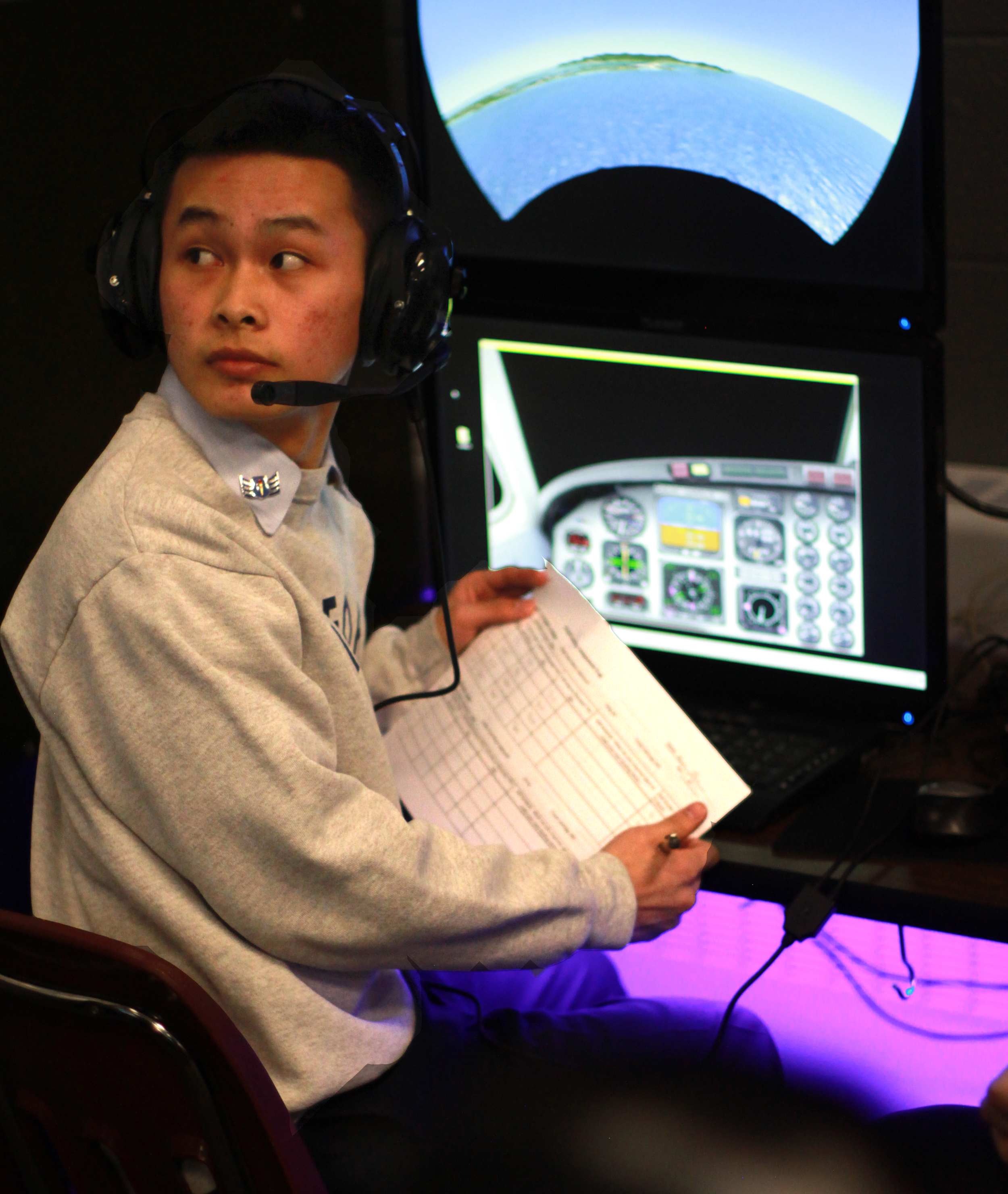 Student Flight Controller at Flight Control Station (FCS)