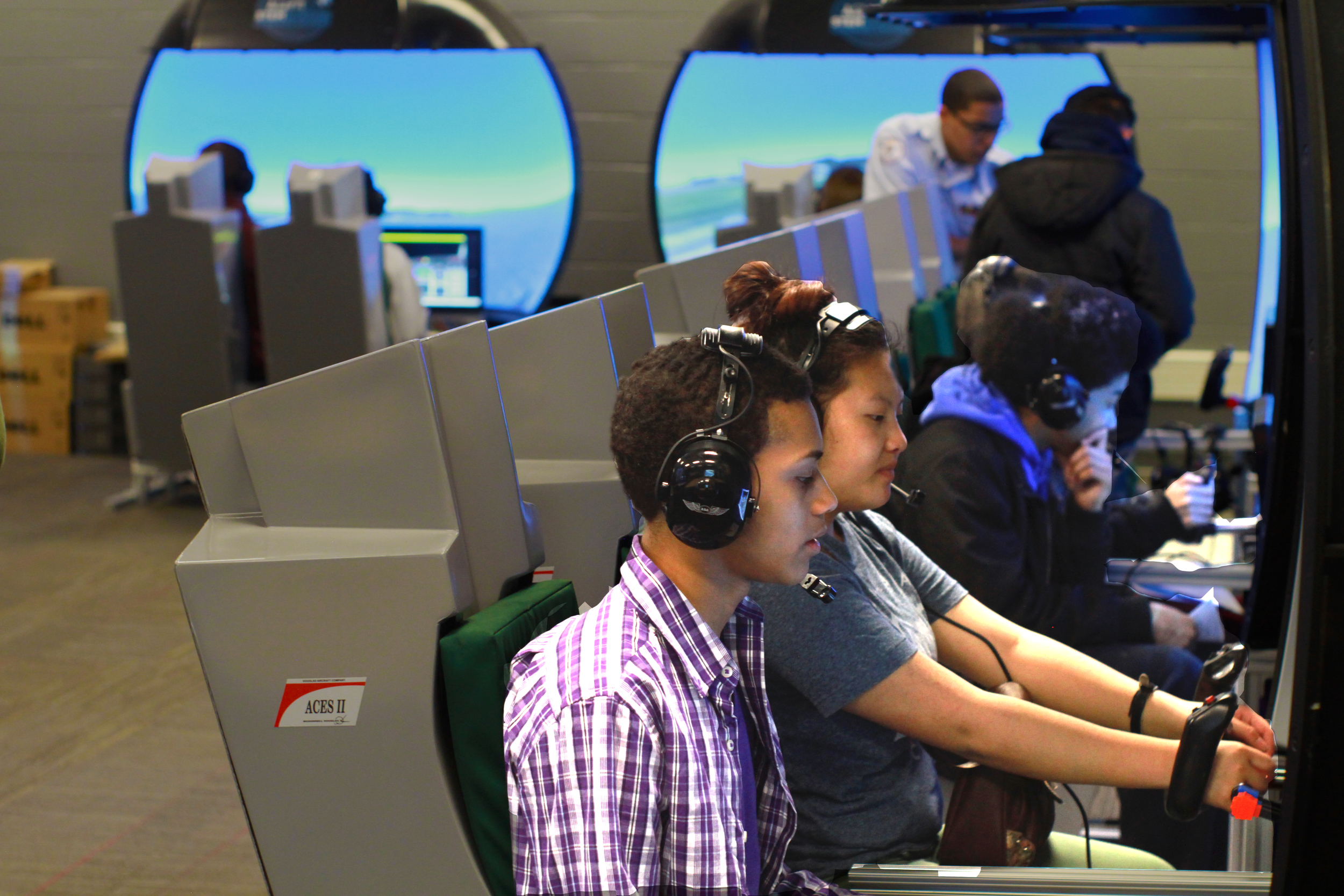 Students working together, Dual Seat Flight Simulator 